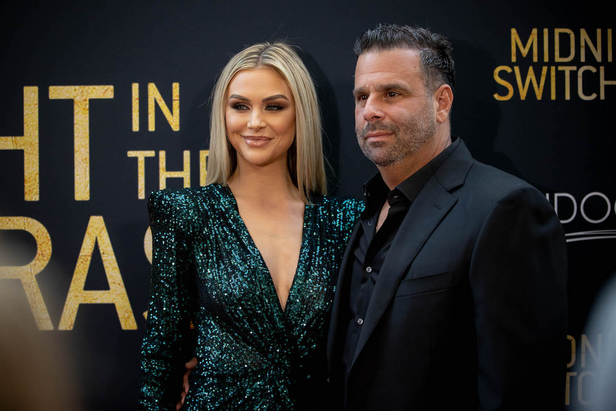 Lala Kent and Randall Emmett pose together at an event.