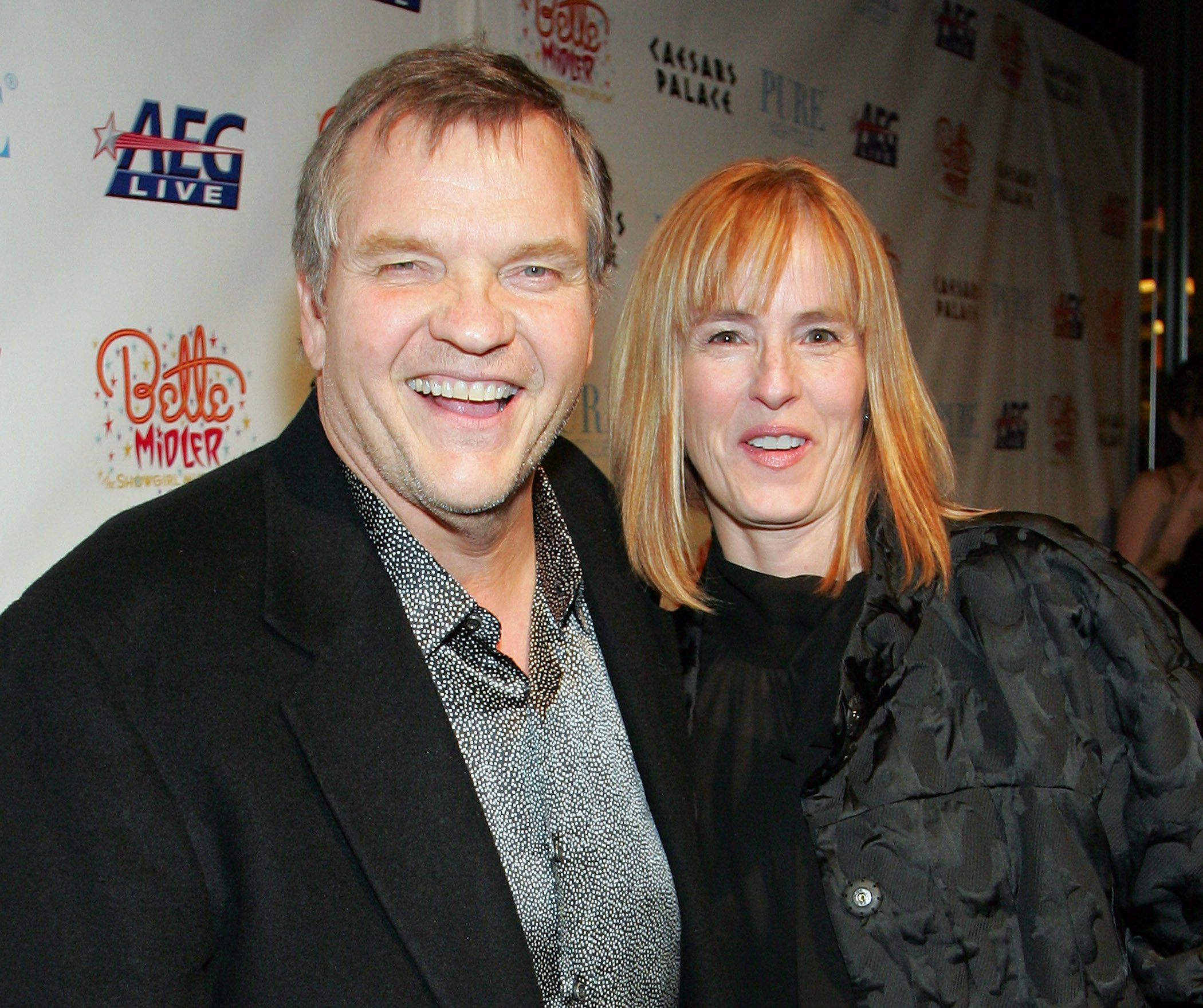 Actor/singer Meat Loaf (L) and wife Deborah Gillespie smiling together at a premiere