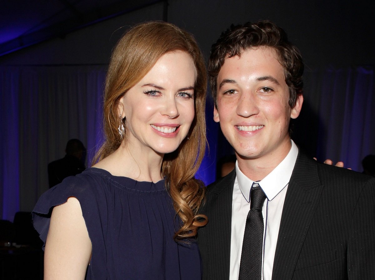 Miles Teller smiling with Nicole Kidman.