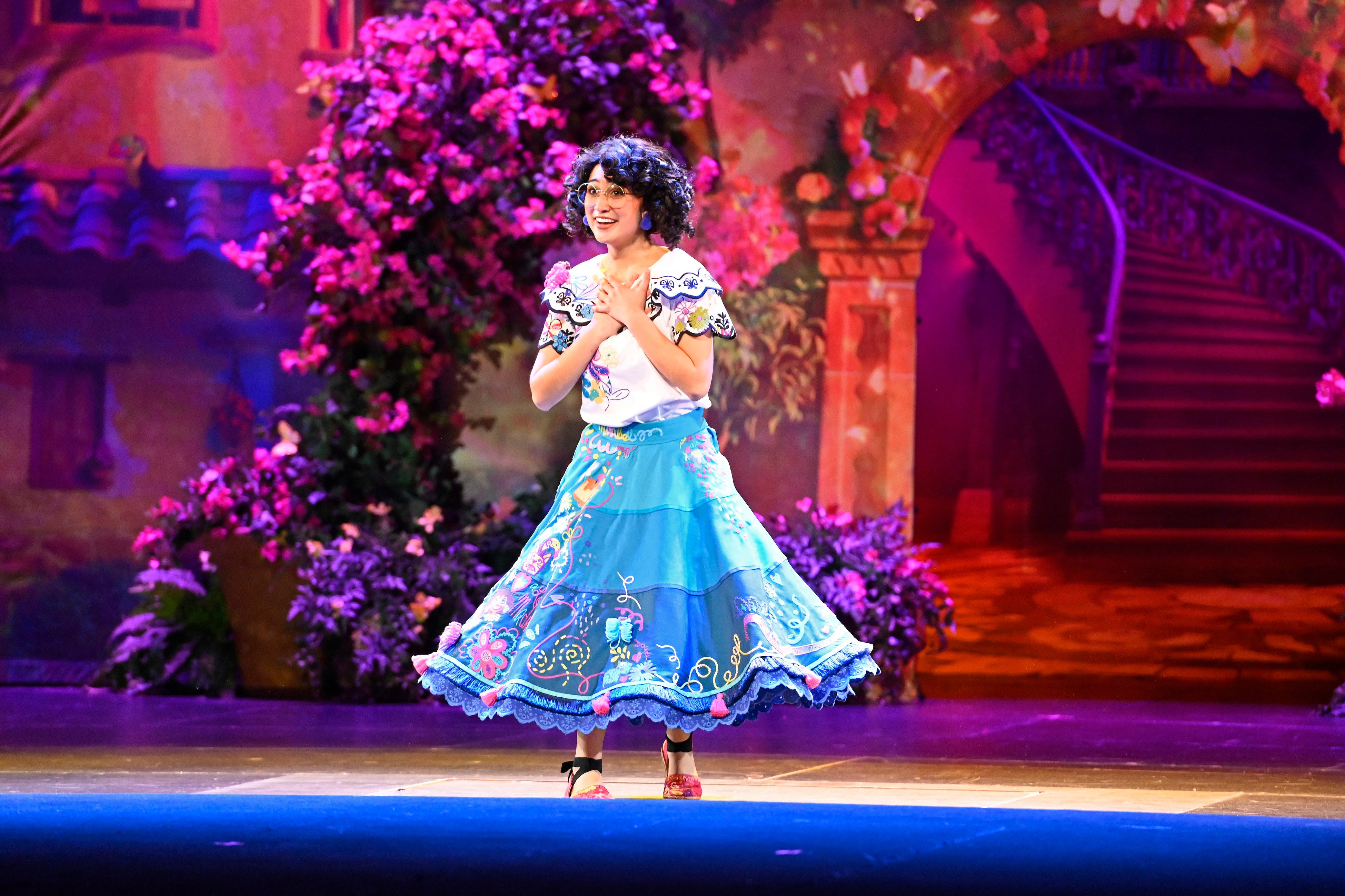 Disney character 'Mirabel' performs at the opening night fan event for Disney's 'Encanto'