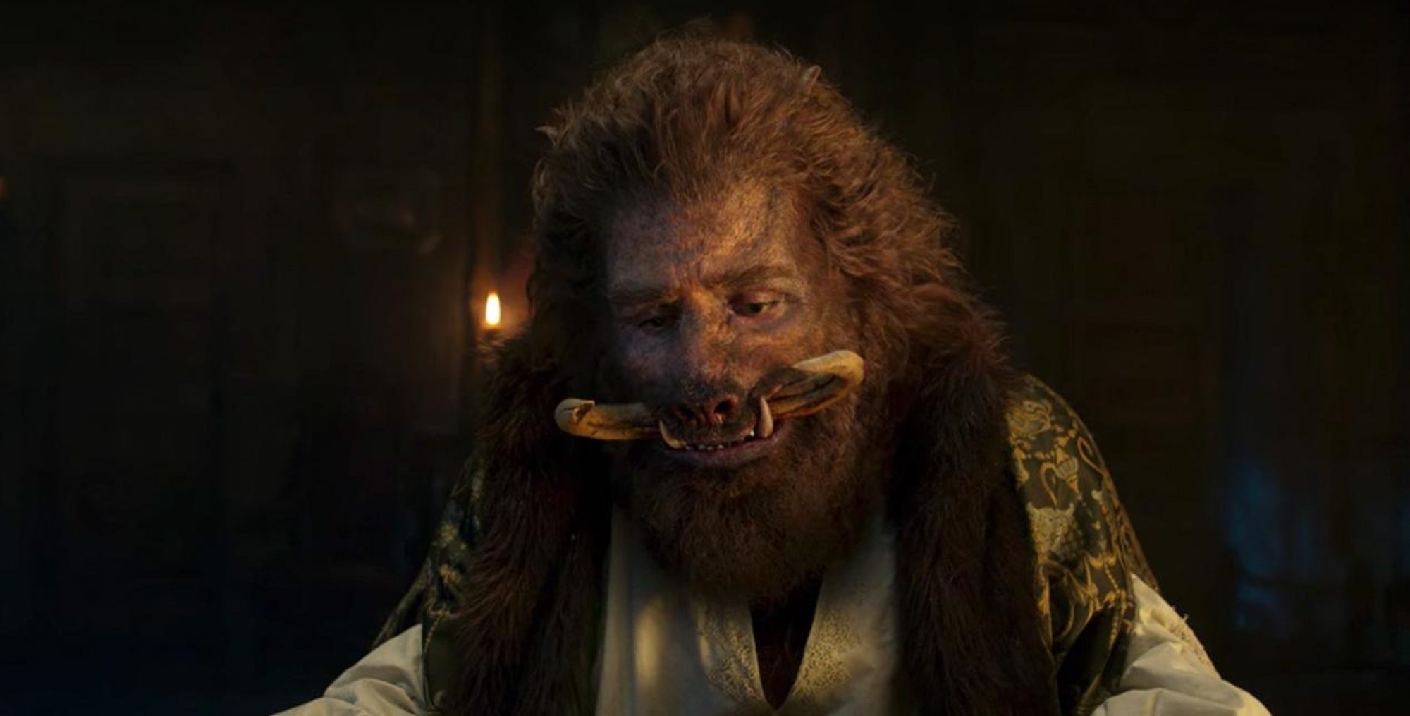 Nivellen in 'The Witcher' Season 2 'Beauty & The Beast' reference at the dinner table.