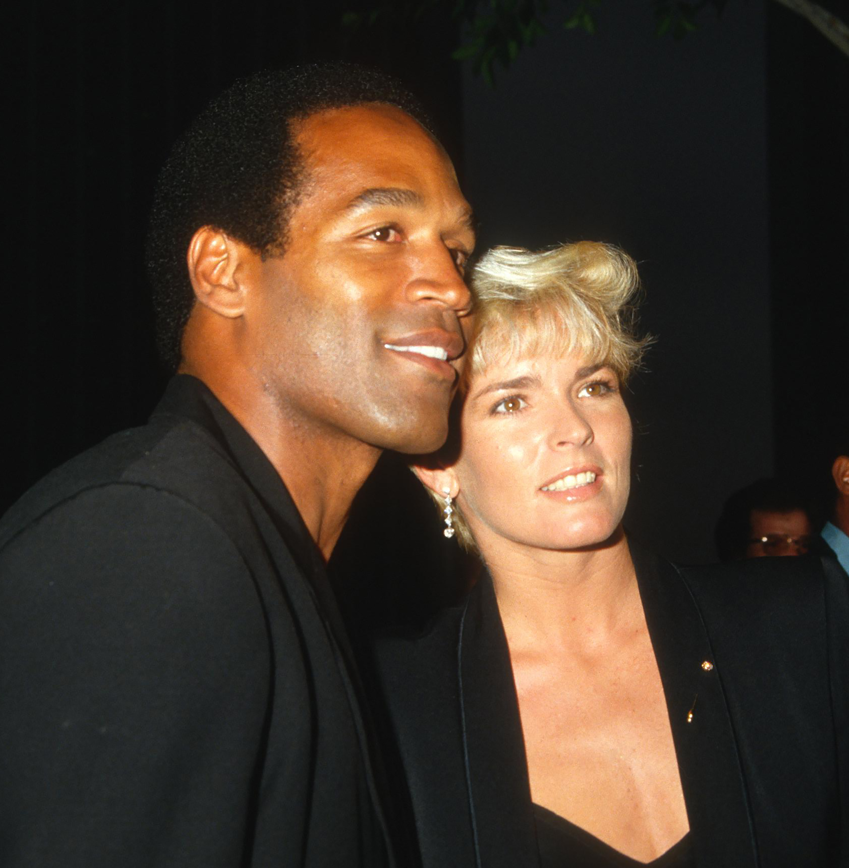 O.J. Simpson and Nicole Brown Simpson attend a movie premiere together in 1987
