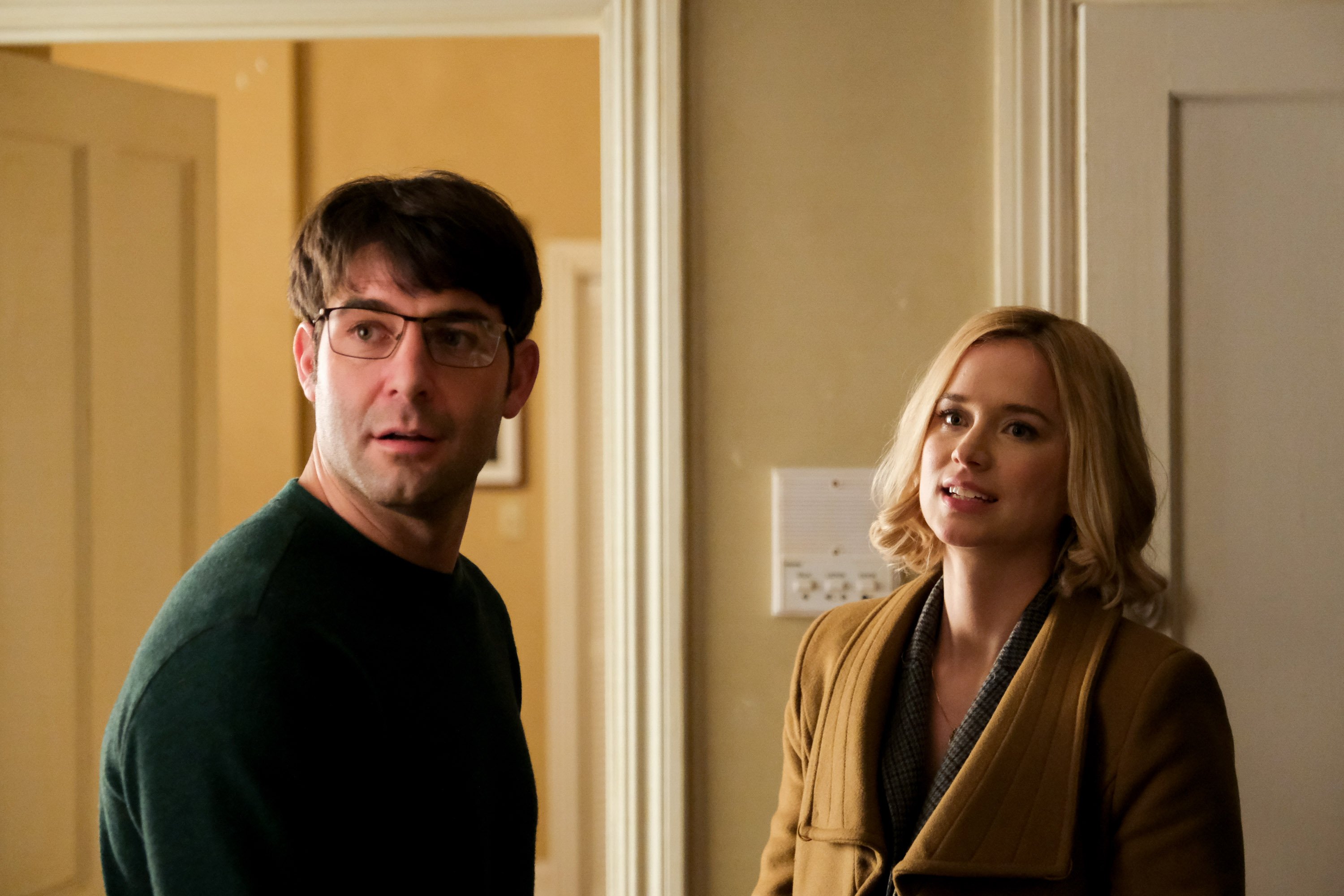 Joe, wearing a long sleeve black shirt, and Jenny, wearing a tan jacket, in 'Ordinary Joe'