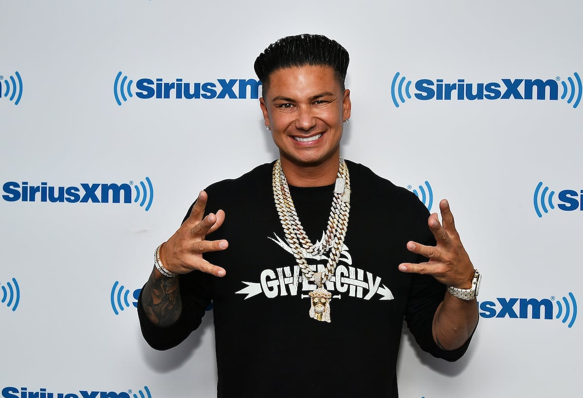 Pauly D poses at an event.