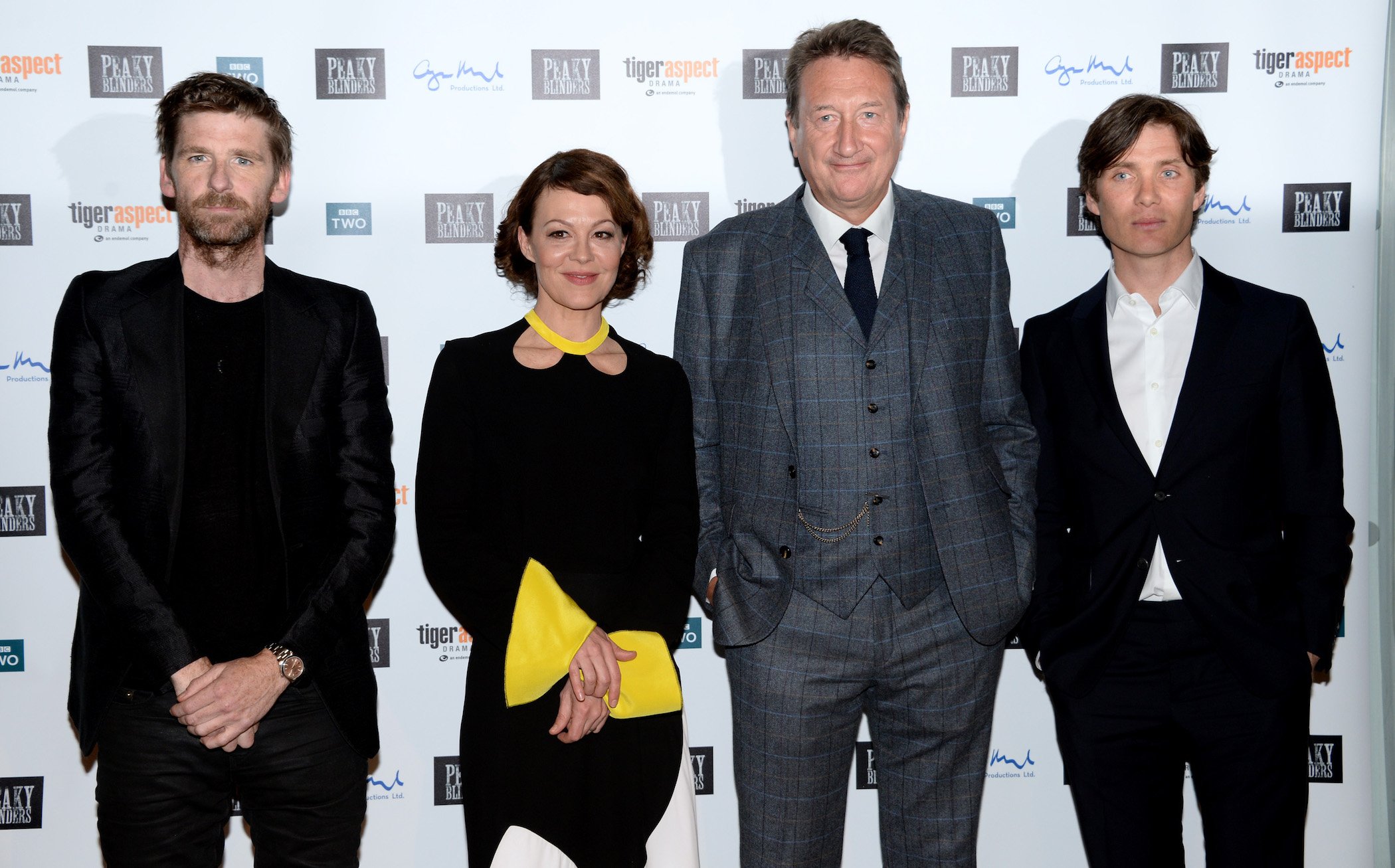 'Peaky Blinders' Season 6 stars Paul Anderson, Helen McCrory, Steven Knight, and Cillian Murphy standing next to each other at an event