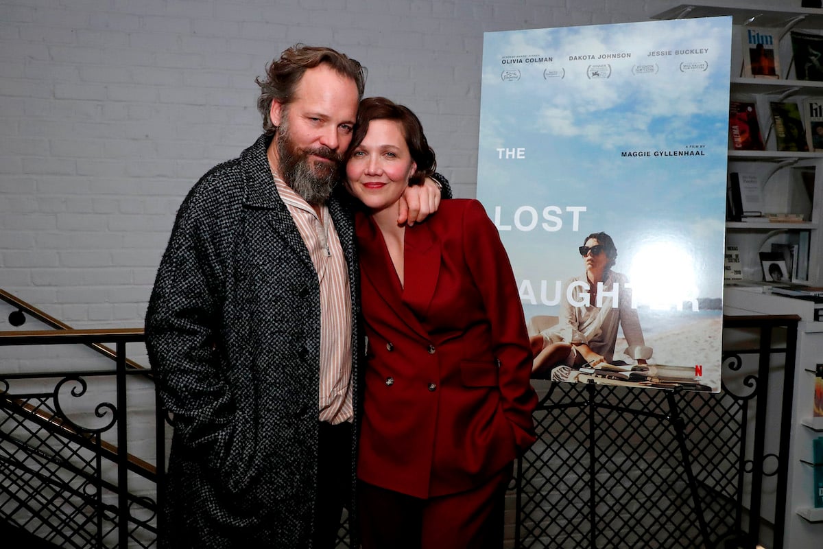 Actors Peter Sarsgaard and Maggie Gyllenhaal pose for a photo at Netflix's 'The Lost Daughter' screening