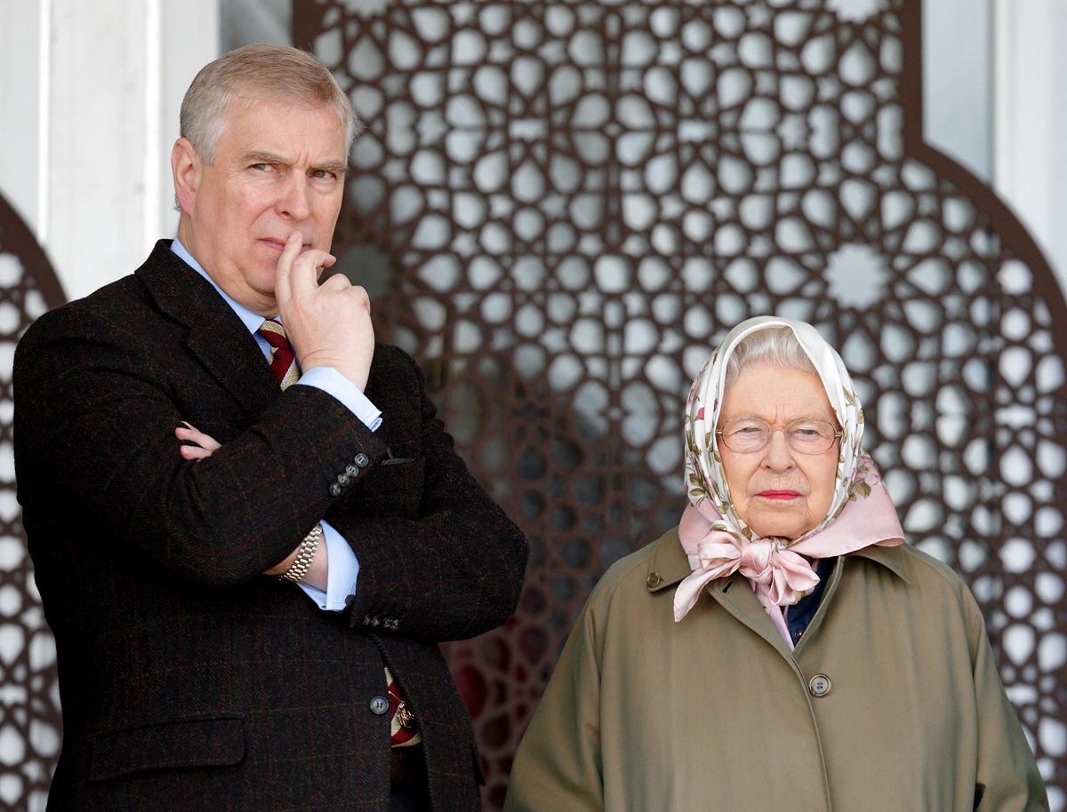 Prince Andrew and Queen Elizabeth II looking on during event at Windsor