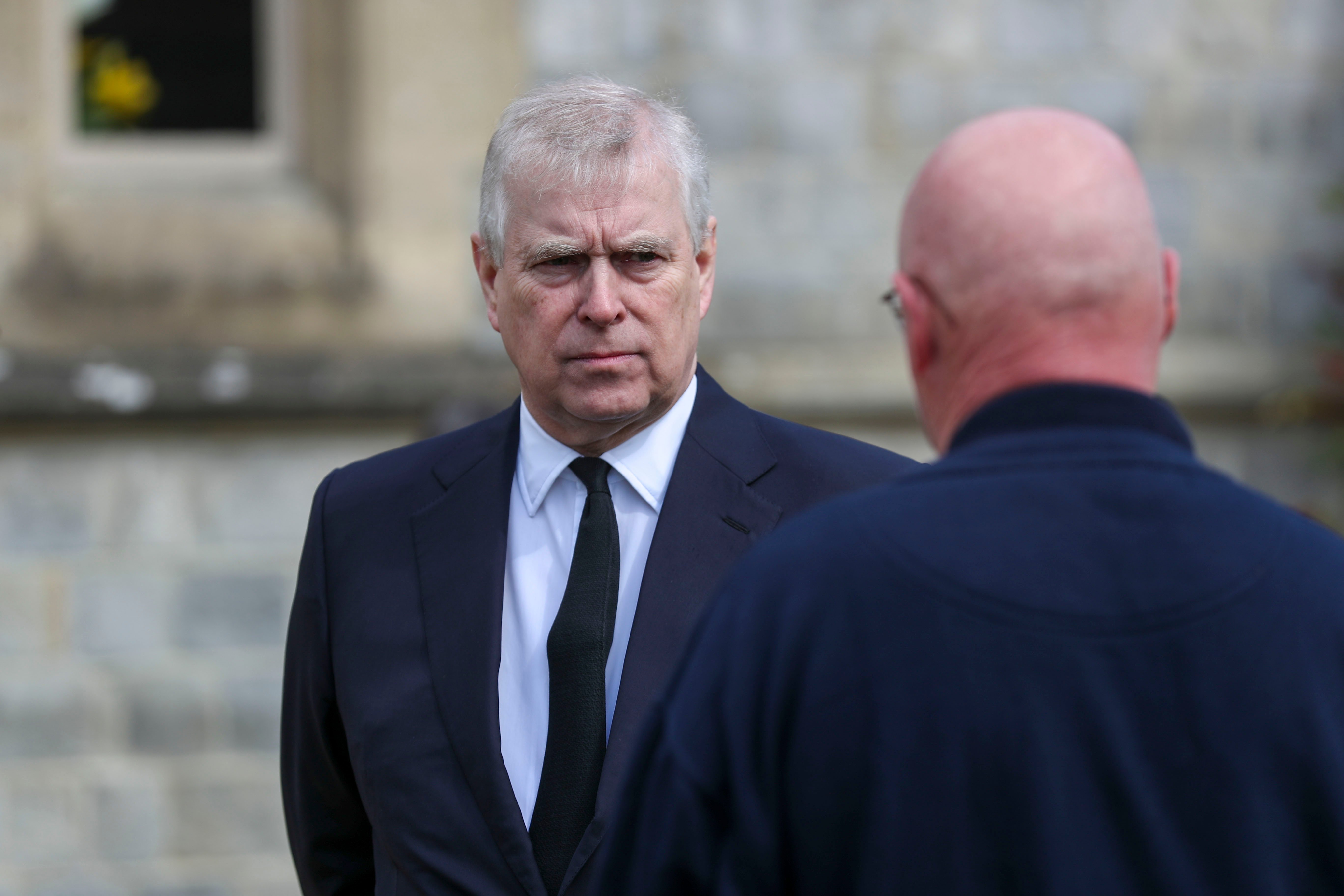 Prince Andrew standing outside Royal Chapel All Saints after a service for his late father Prince Philip