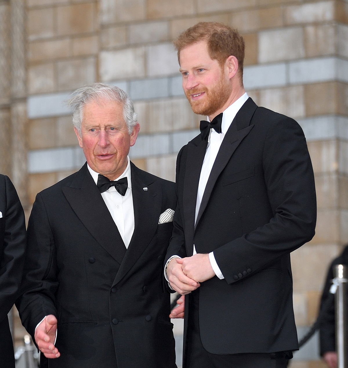 Prince Charles and Prince Harry dressed in tuxedos at the 'Our Planet' premiere