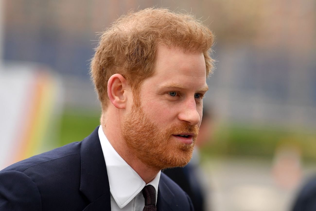 Prince Harry looking at something off-camera to the right, closeup