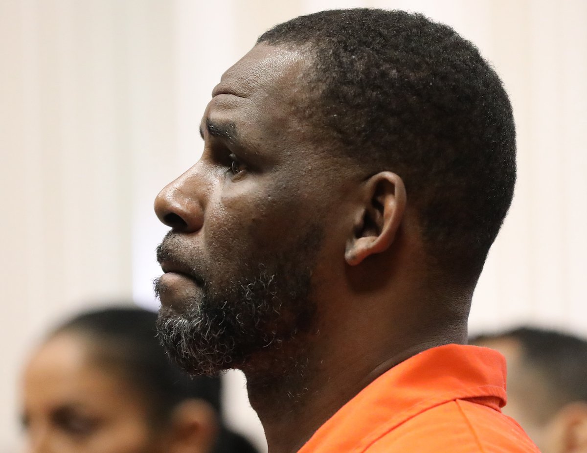 R. Kelly stands in court