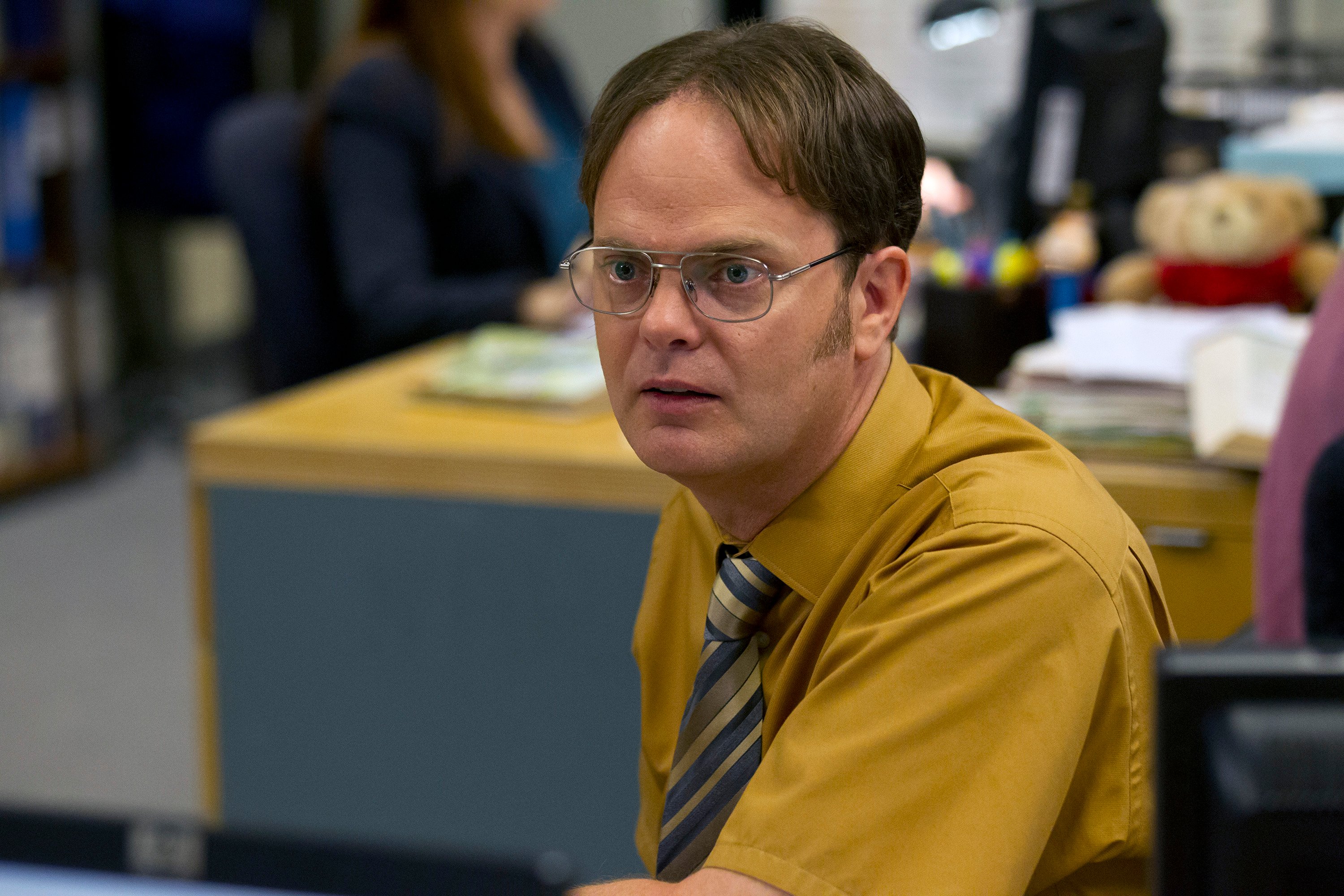 Rainn Wilson as Dwight Schrute wearing his quintessential wardrobe in 'The Office'