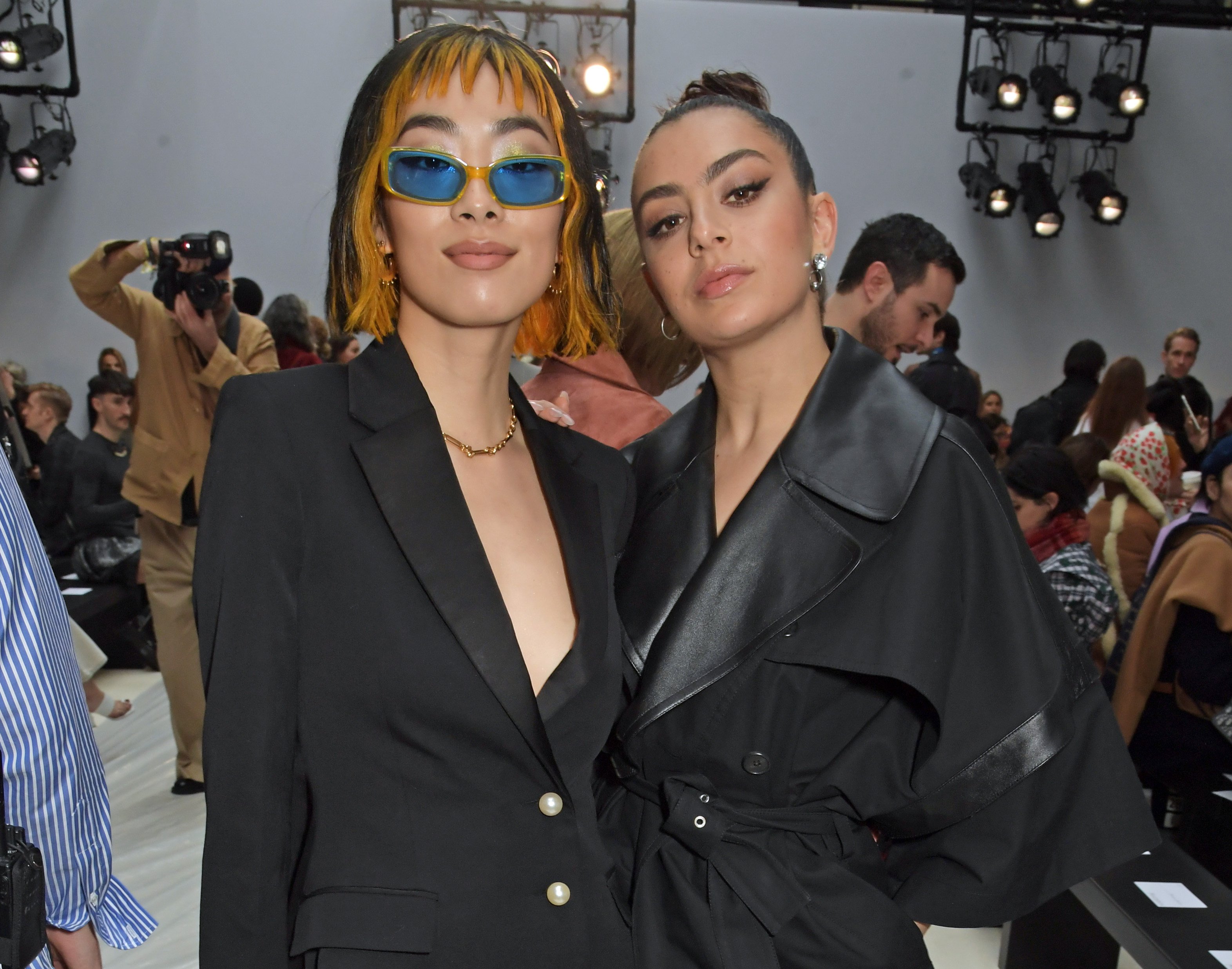 Rina Sawayama and Charli XCX attend the JW Anderson show