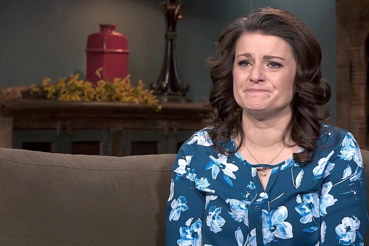 Robyn Brown crying and wearing a blue floral shirt on Sister Wives' | TLC