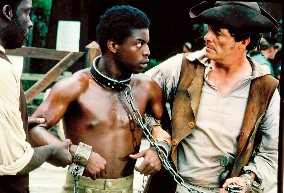 LeVar Burton and Vic Morrow film a 'Roots' scene