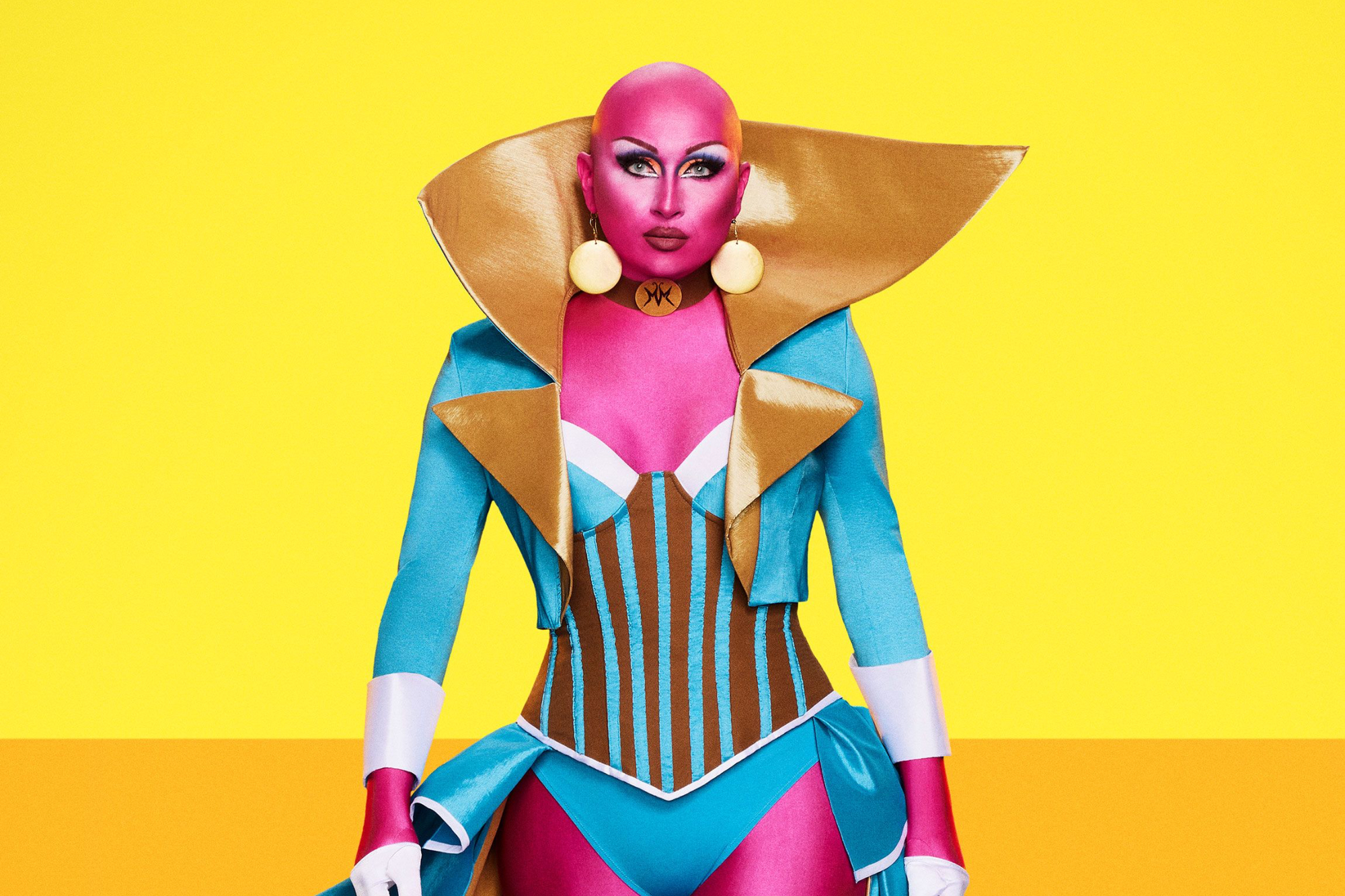 'RuPaul's Drag Race Untucked' Season 14 Episode 2 Maddy Morphosis with pink-painted skin and wearing blue and gold