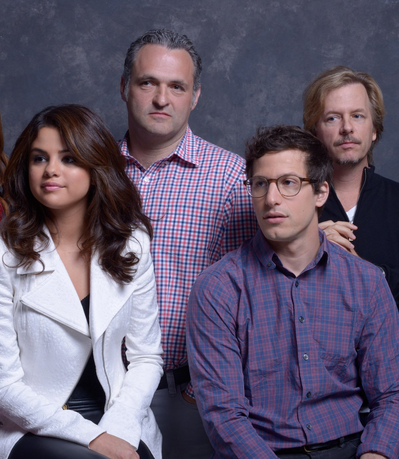 Selena Gomez, Andy Samberg, and David Spade pose with 'Hotel Transylvania' director Genndy Tartakovsky