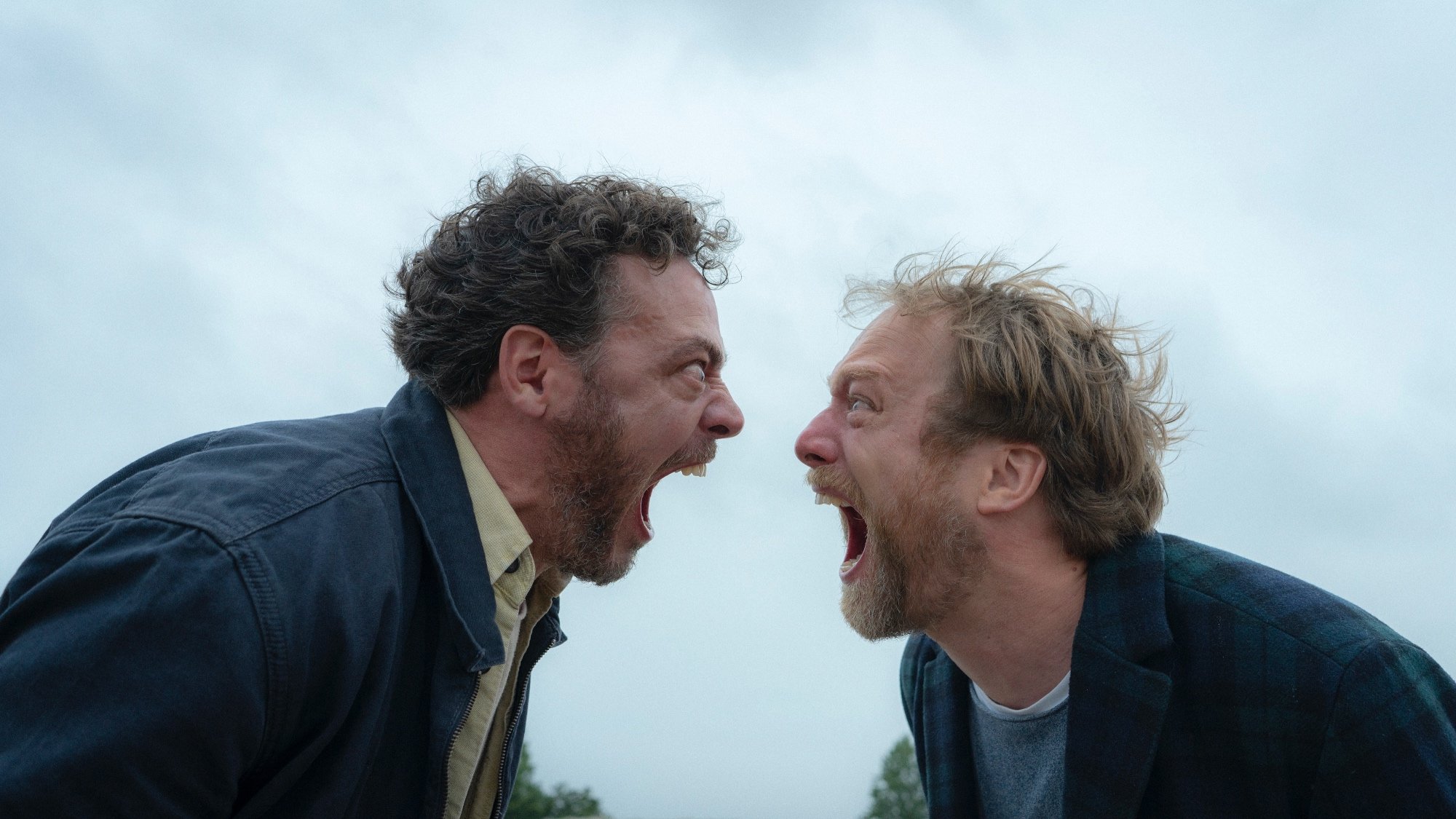 'Speak No Evil' Fedja van Huêt as Patrick and Morten Burian as Bjørn screaming in each other's faces wearing jackets