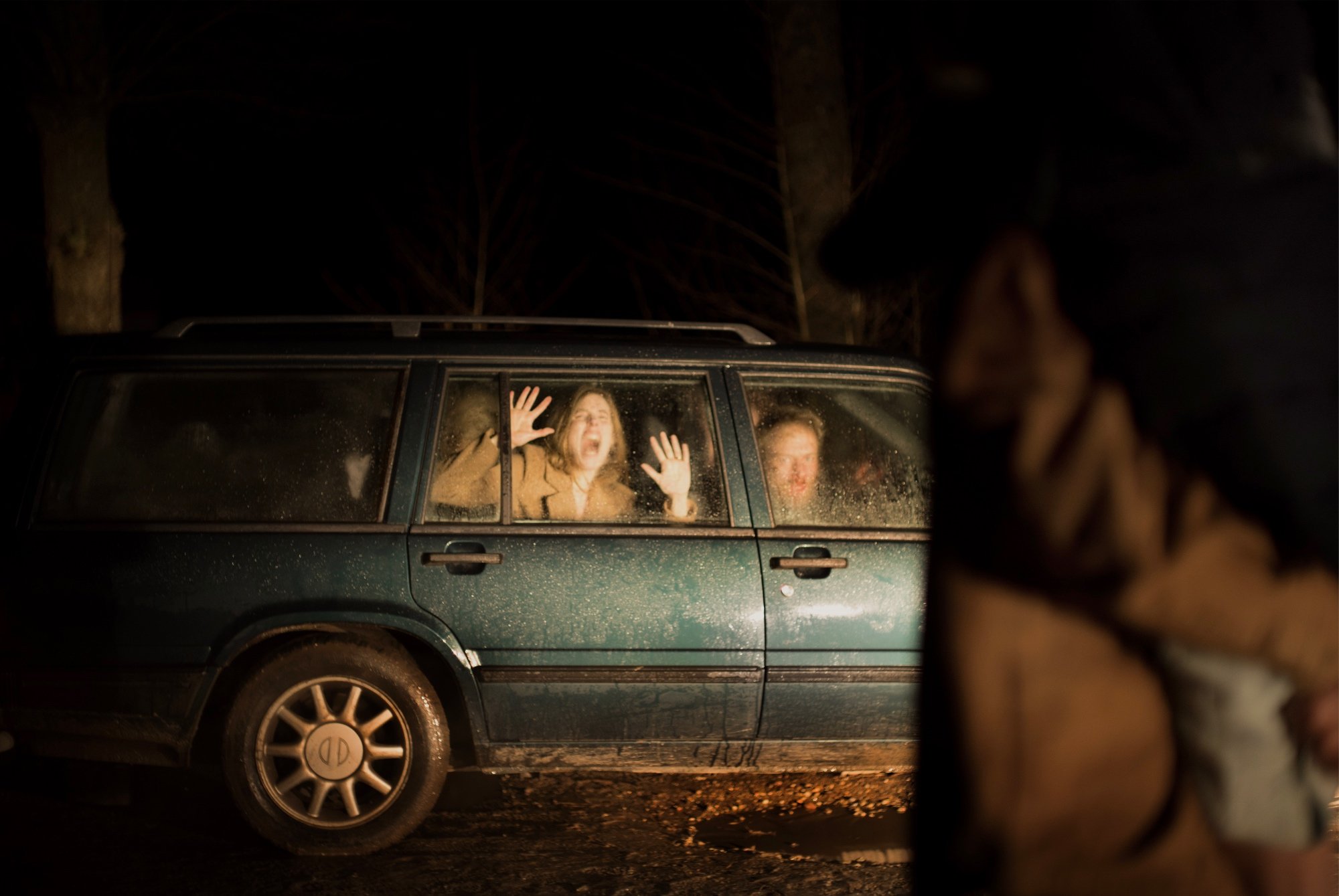 'Speak No Evil' Sidsel Siem Koch as Louise and Morten Burian as Bjørn sitting in a car screaming at the window.