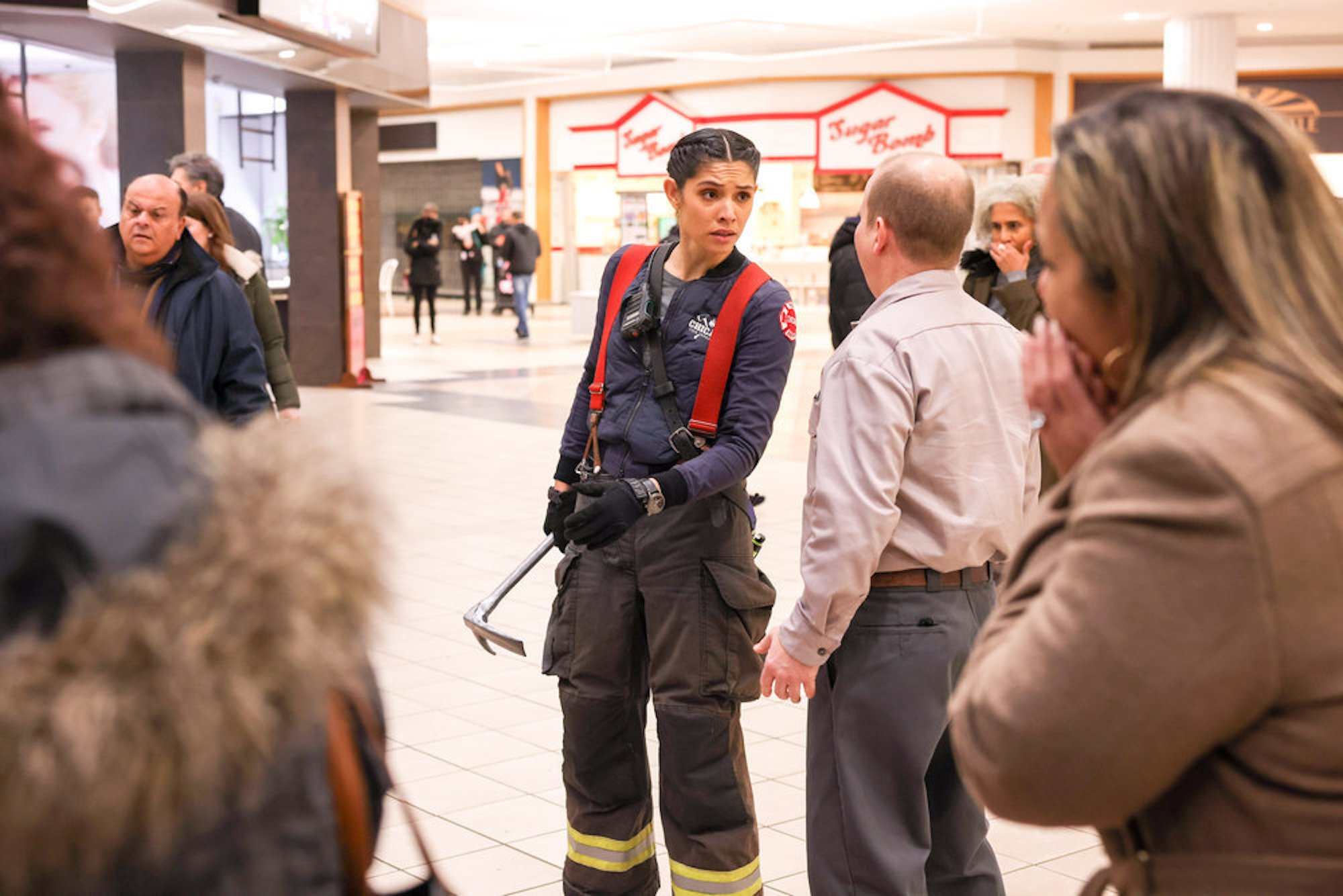 Stella Kidd in uniform talking to bystanders in 'Chicago Fire' Season 10 Episode 12