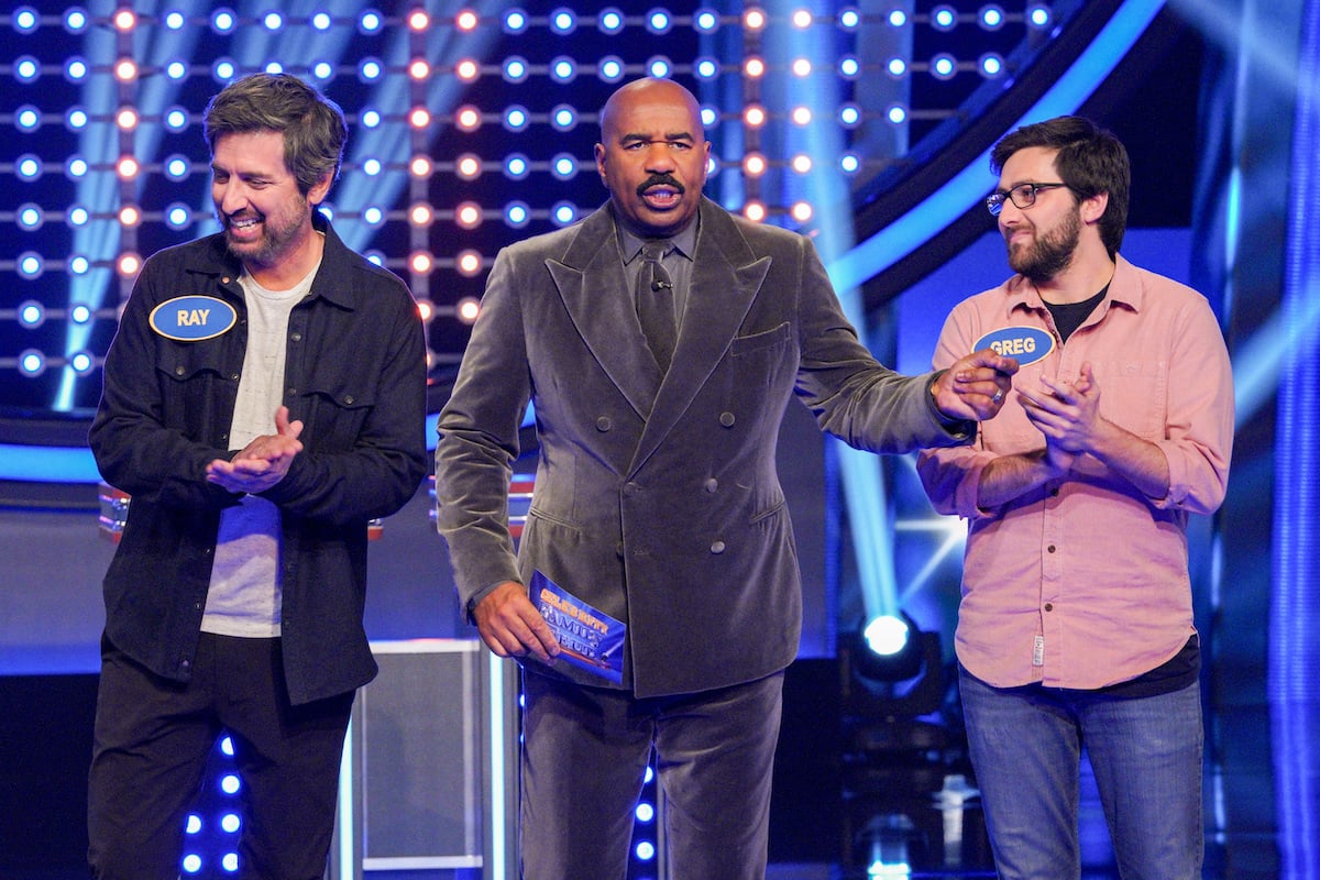 Steve Harvey hosts Ray Romano and Brad Garrett during a Family Feud episode