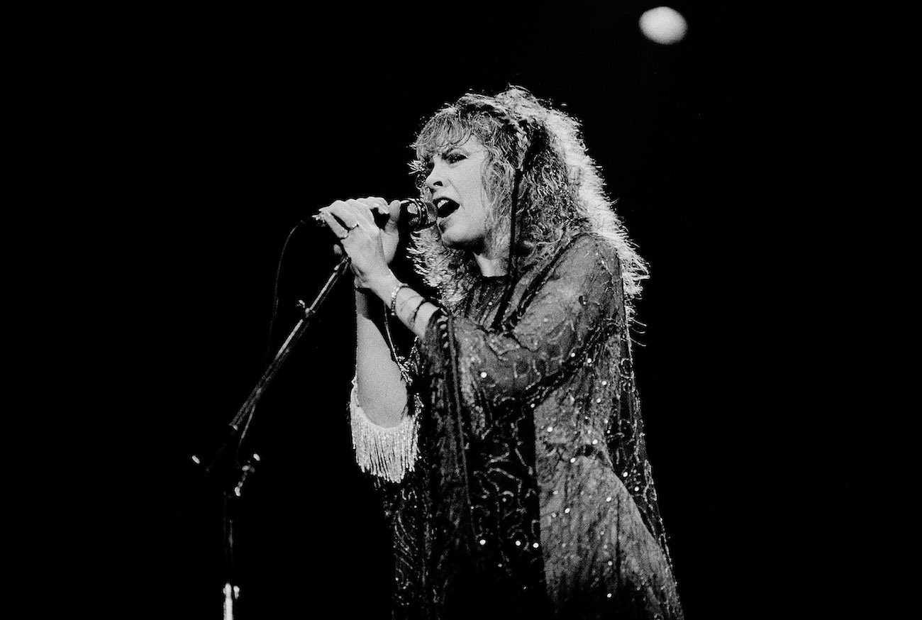 Stevie Nicks performing in a beaded shawl at the Rosemont Horizon, in Illinois, 1983.