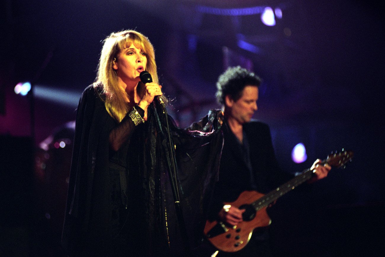 Stevie Nicks performing in black with Fleetwood Mac at the 1998 BRIT Awards.