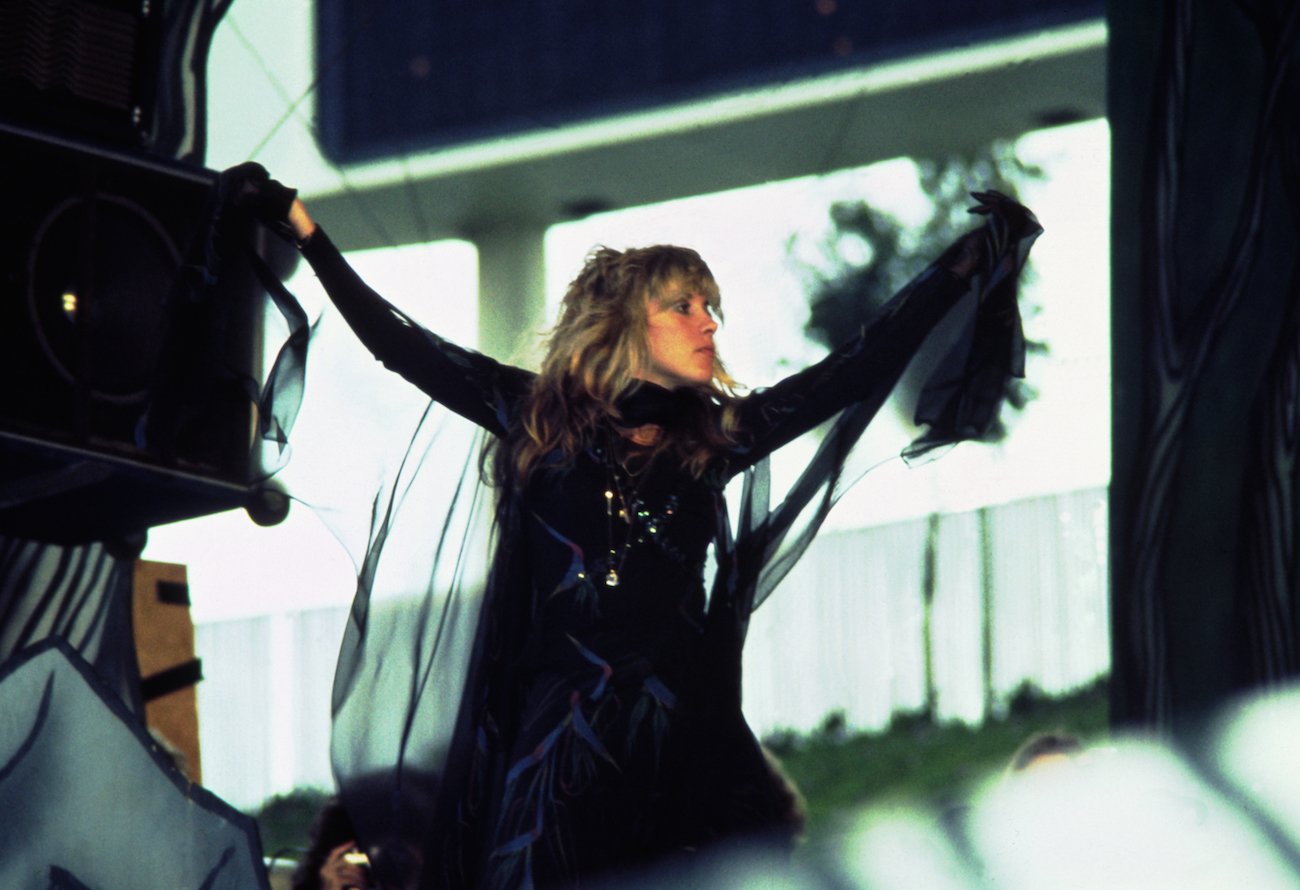 Stevie Nicks wearing black while performing with Fleetwood Mac in Oakland, California, 1977.