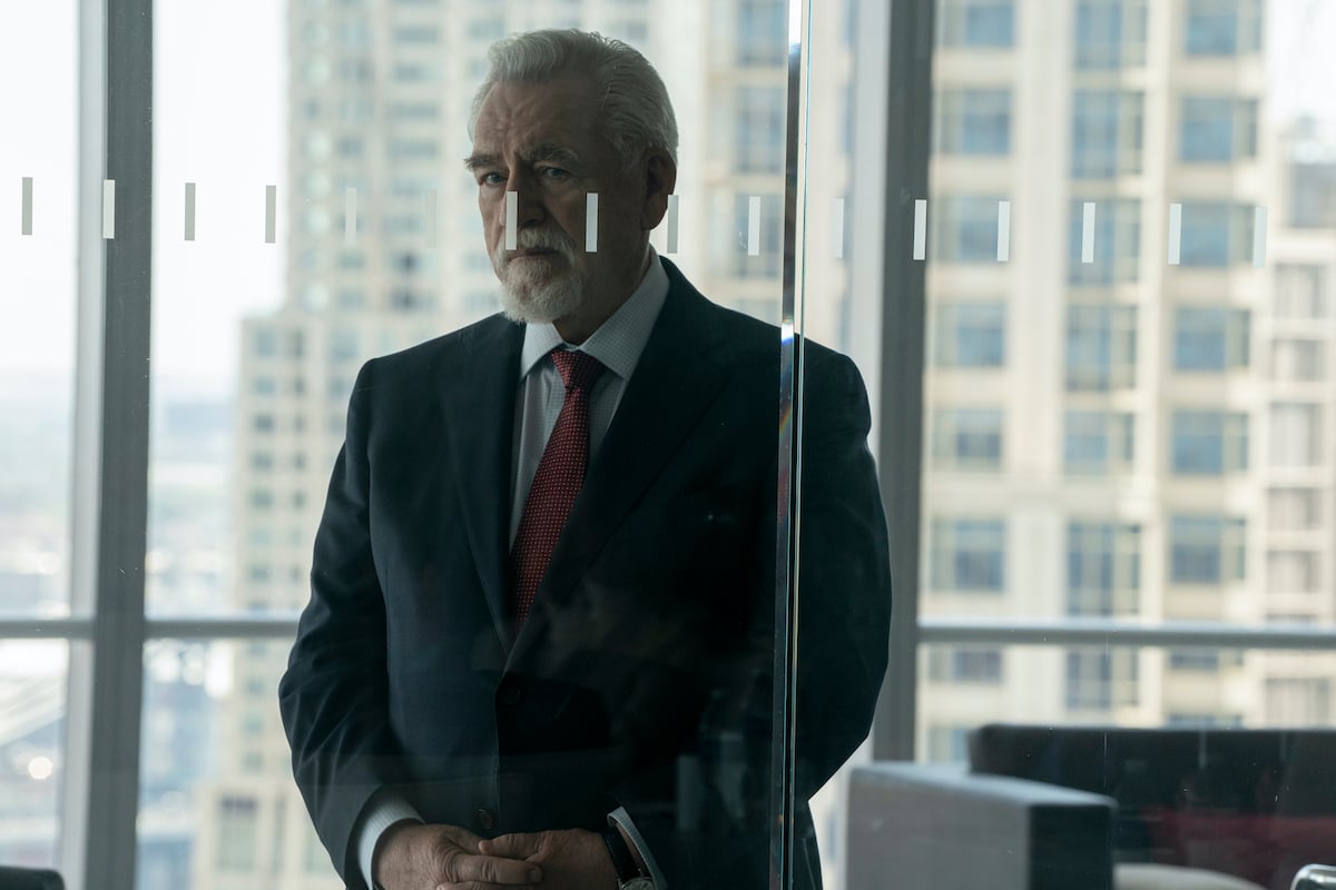 'Succession': Logan Roy (Brian Cox) looks through glass doors with hands folded