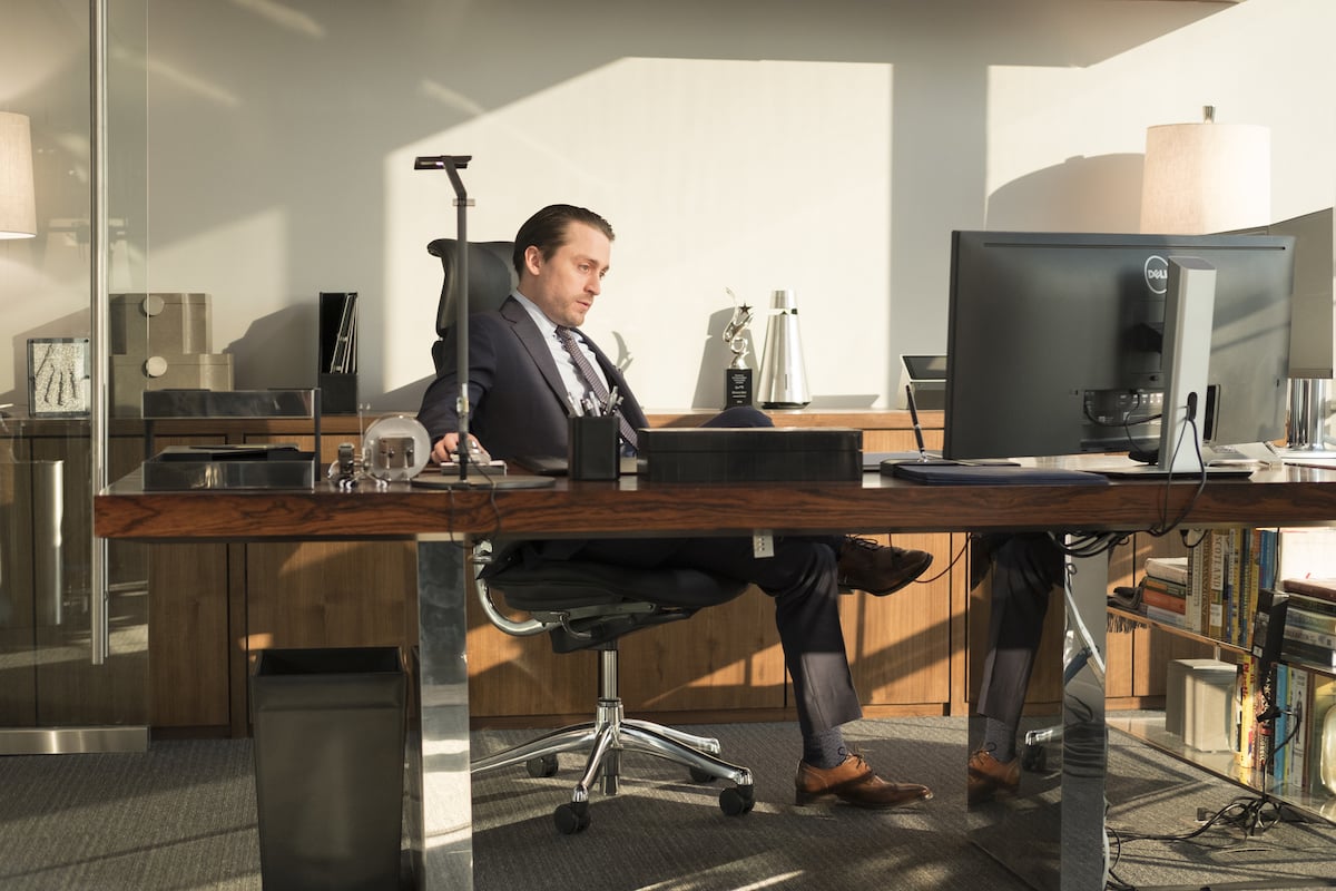 'Succession': Roman Roy (Kieran Culkin) sits awkwardly in a chair at his office desk