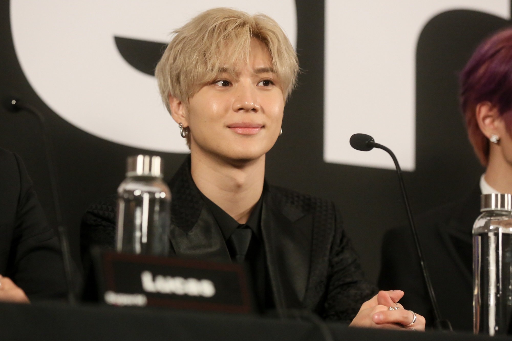 Taemin at a press conference for SuperM's debut EP in 2019