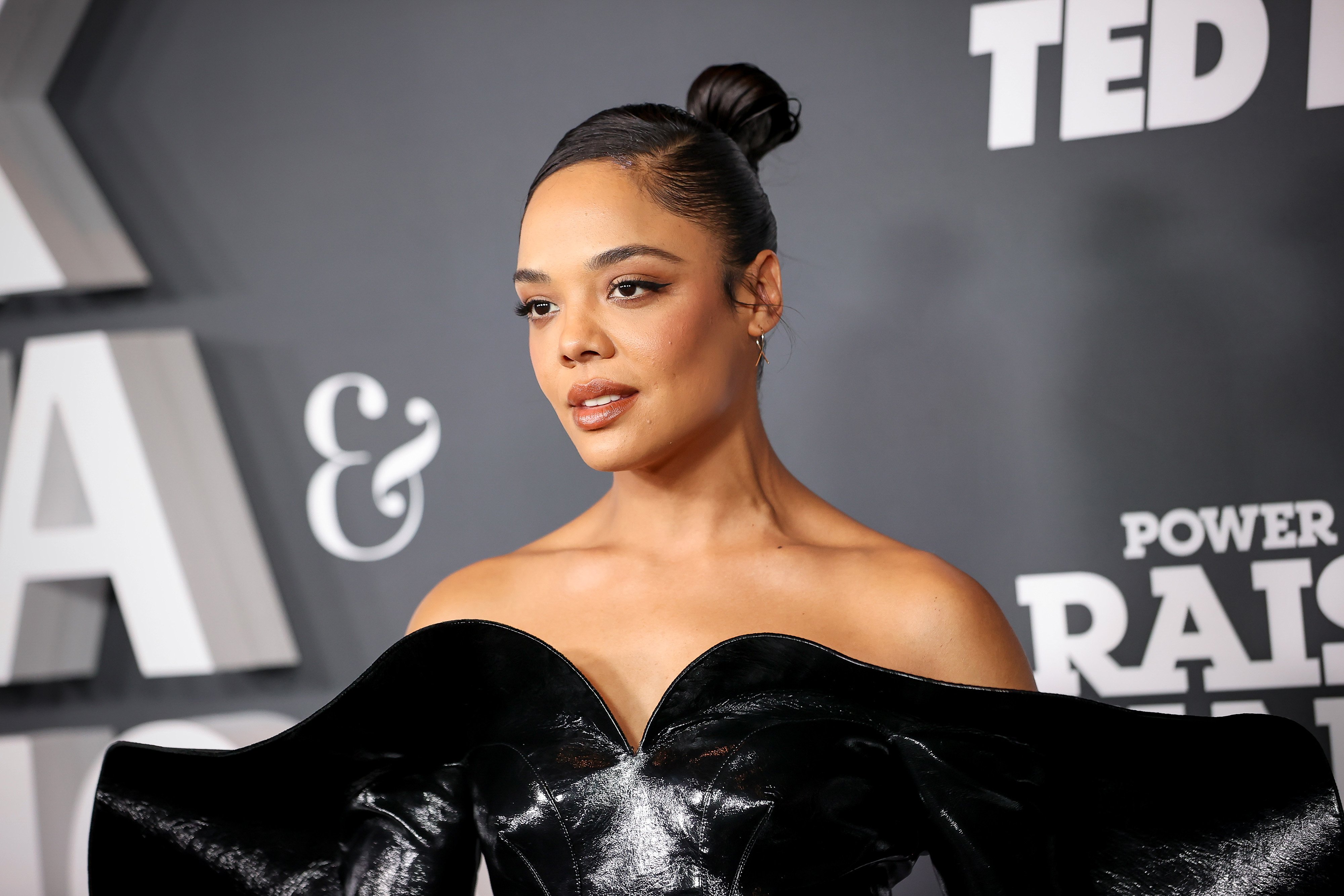 'Thor: Love and Thunder' star Tessa Thompson, who plays Valkyrie in the movie, wears a black off-the-shoulder dress.