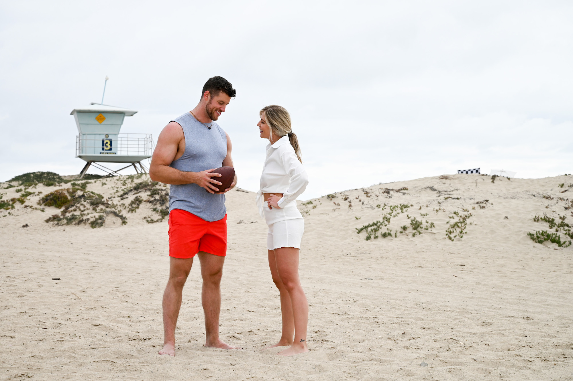 'The Bachelor' villain Shanae Ankney and Clayton Echard stand on a beach during a group date.