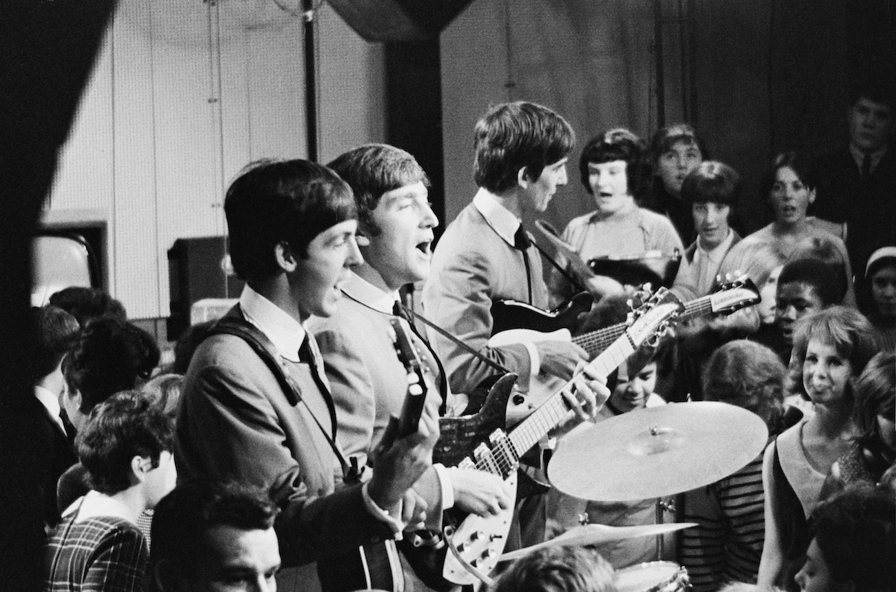 The Beatles performing in front of fans on the TV show, 'Ready Steady Go!' in 1963.