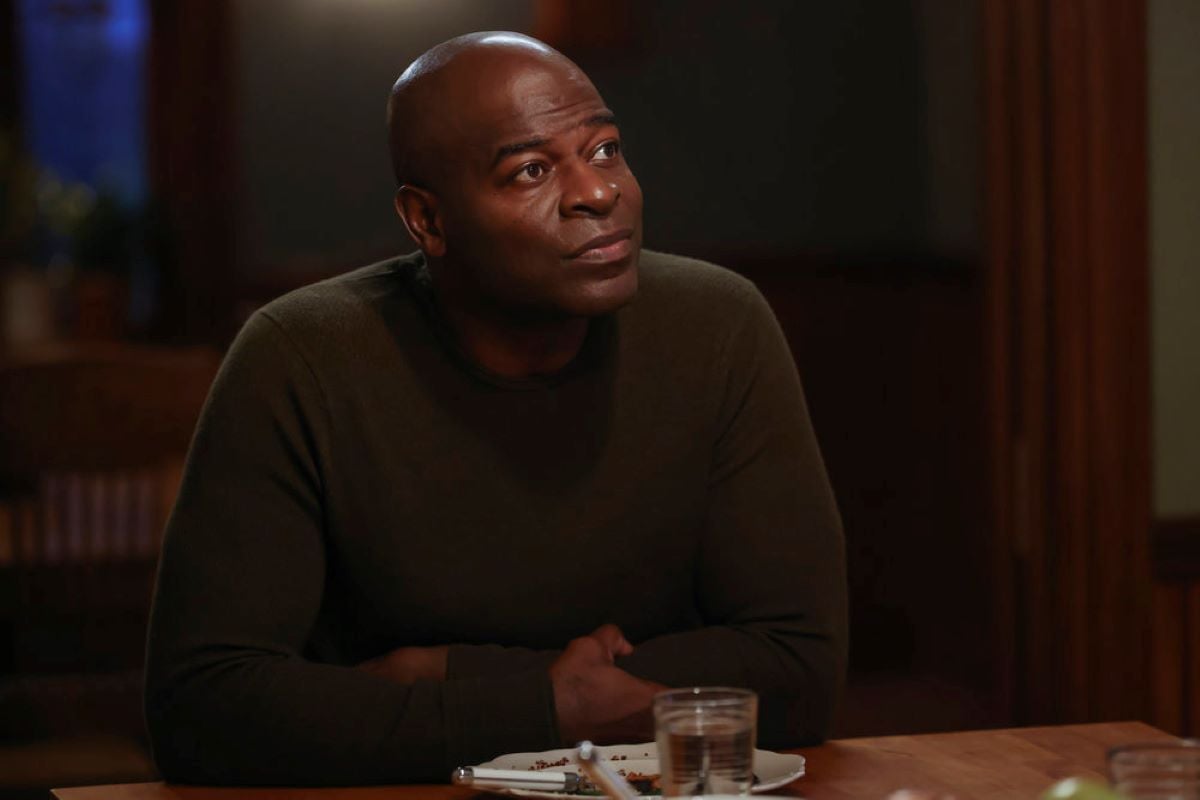 'The Blacklist' Season 9 star Hisham Tawfiq, in character as Dembe Zuma, wears a brown sweater in the new episode tonight, 'Boukman Baptiste.'