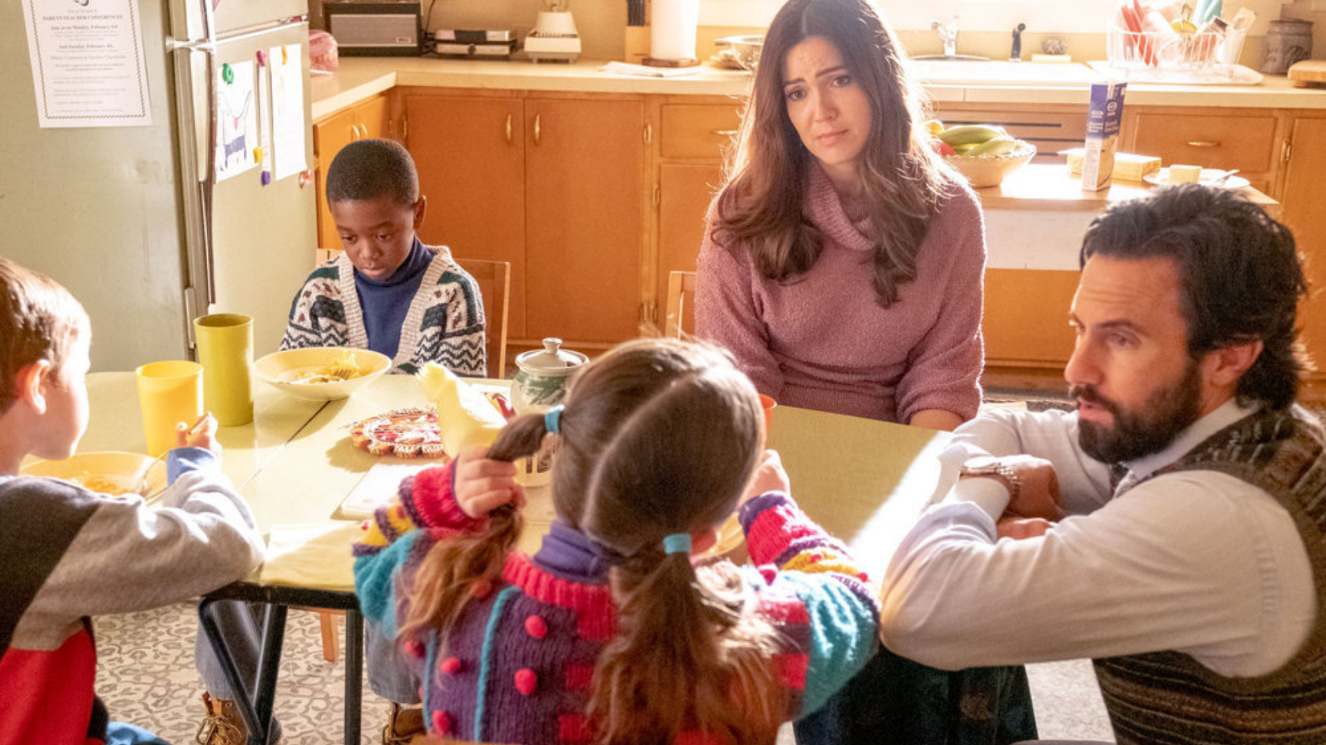 Isabella Rose Landau as Kate, Kaz Womack as Kevin, Ca'Ron Jaden Coleman as Randall, Mandy Moore as Rebecca, and Milo Ventimiglia as Jack sit together in the This Is Us Season 6 premiere