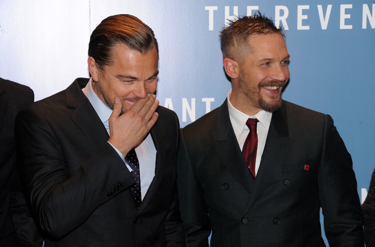 Leonardo DiCaprio and Tom Hardy have a laugh while they attend the UK Premiere of "The Revenant" at Empire Leicester Square on January 14, 2016 in London, England