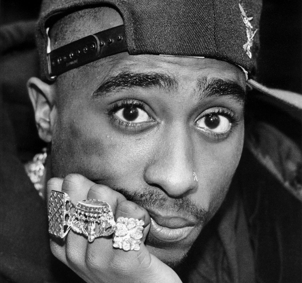 Tupac Shakur poses for photo