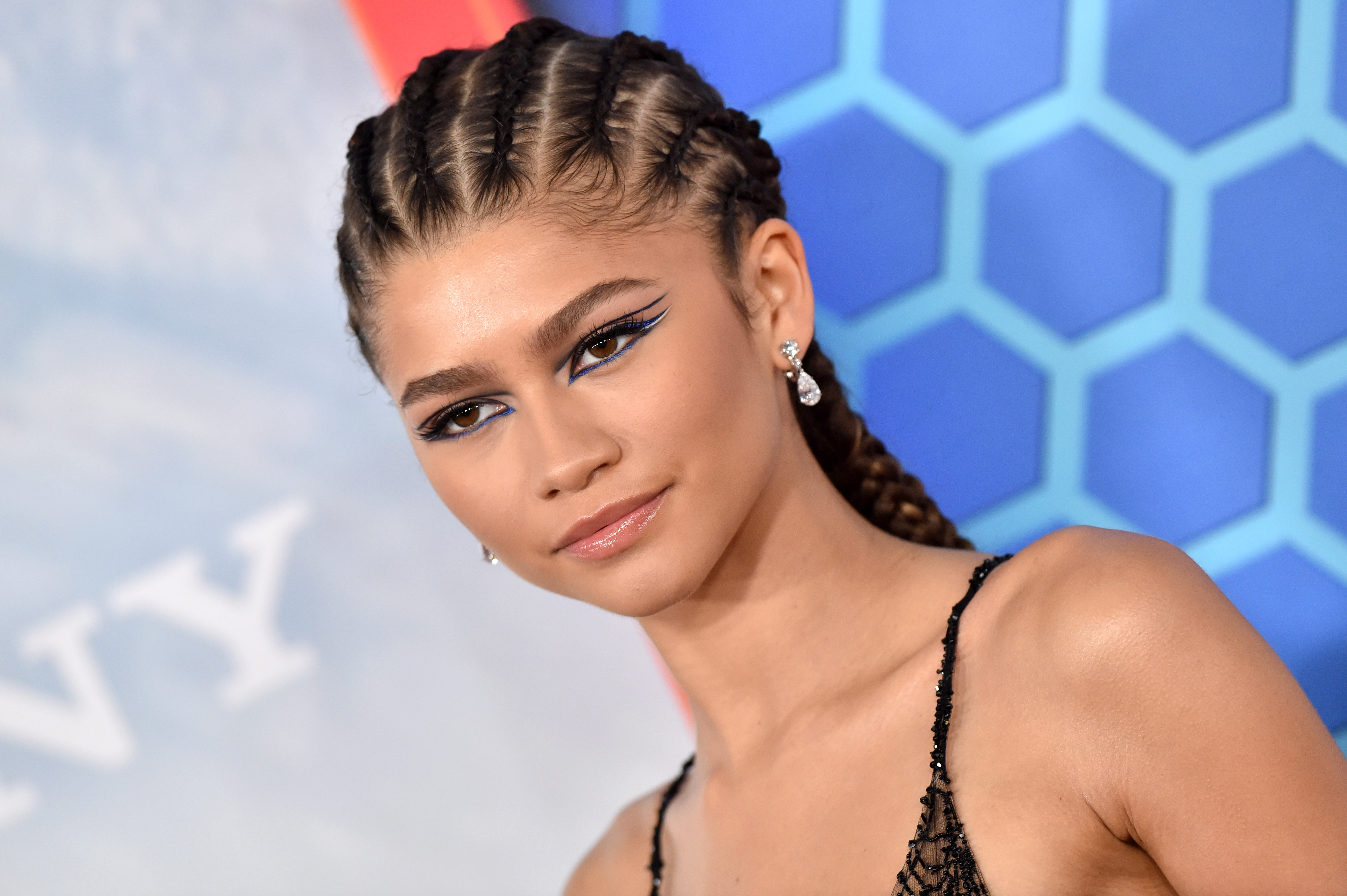 'Spider-Man: No Way Home' star Zendaya wears a black dress that is made to look like spider webs.