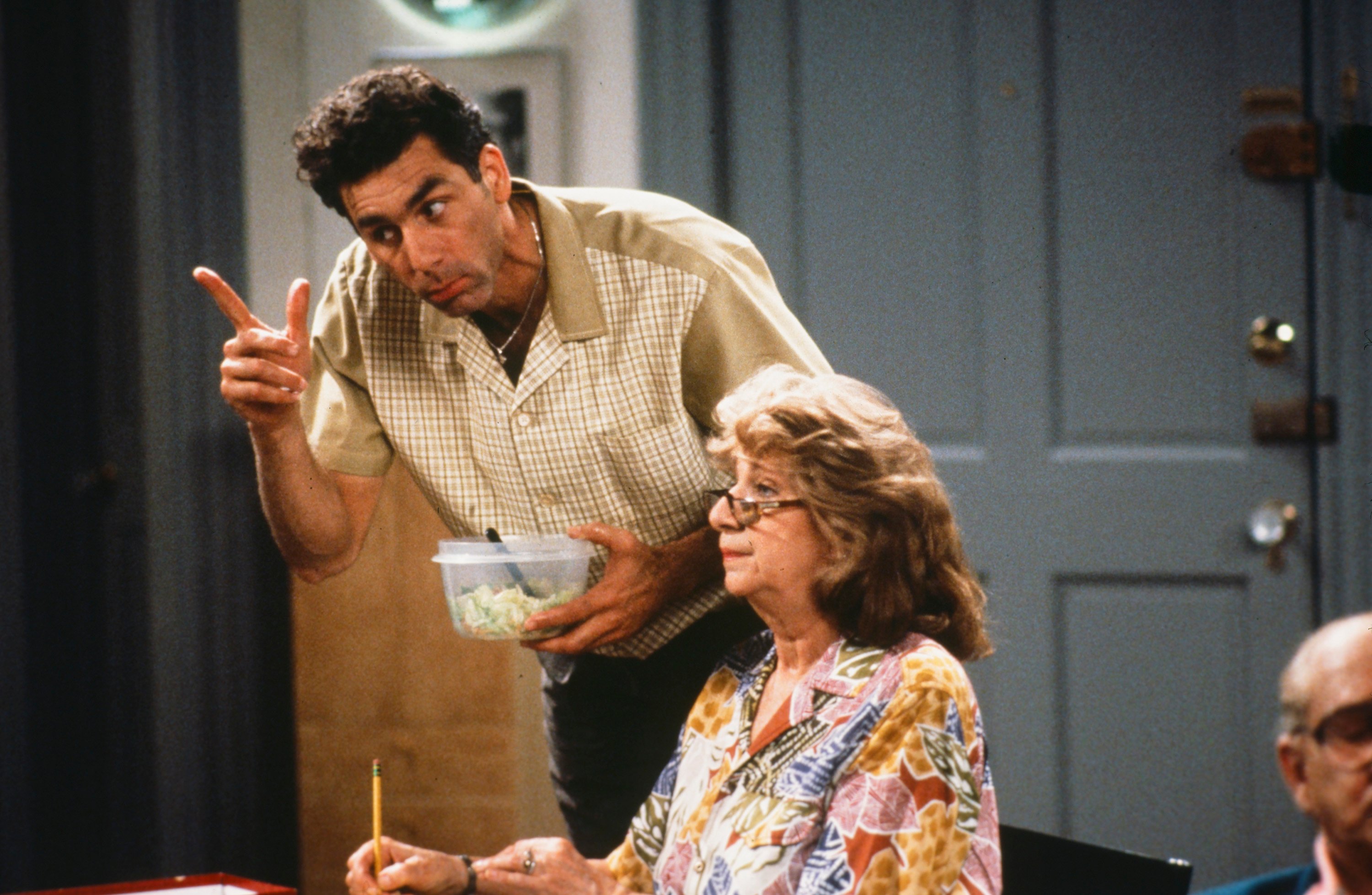 Kramer and Jerry's mom, Helen Seinfeld in Jerry's apartment during an episode of 'Seinfeld' 