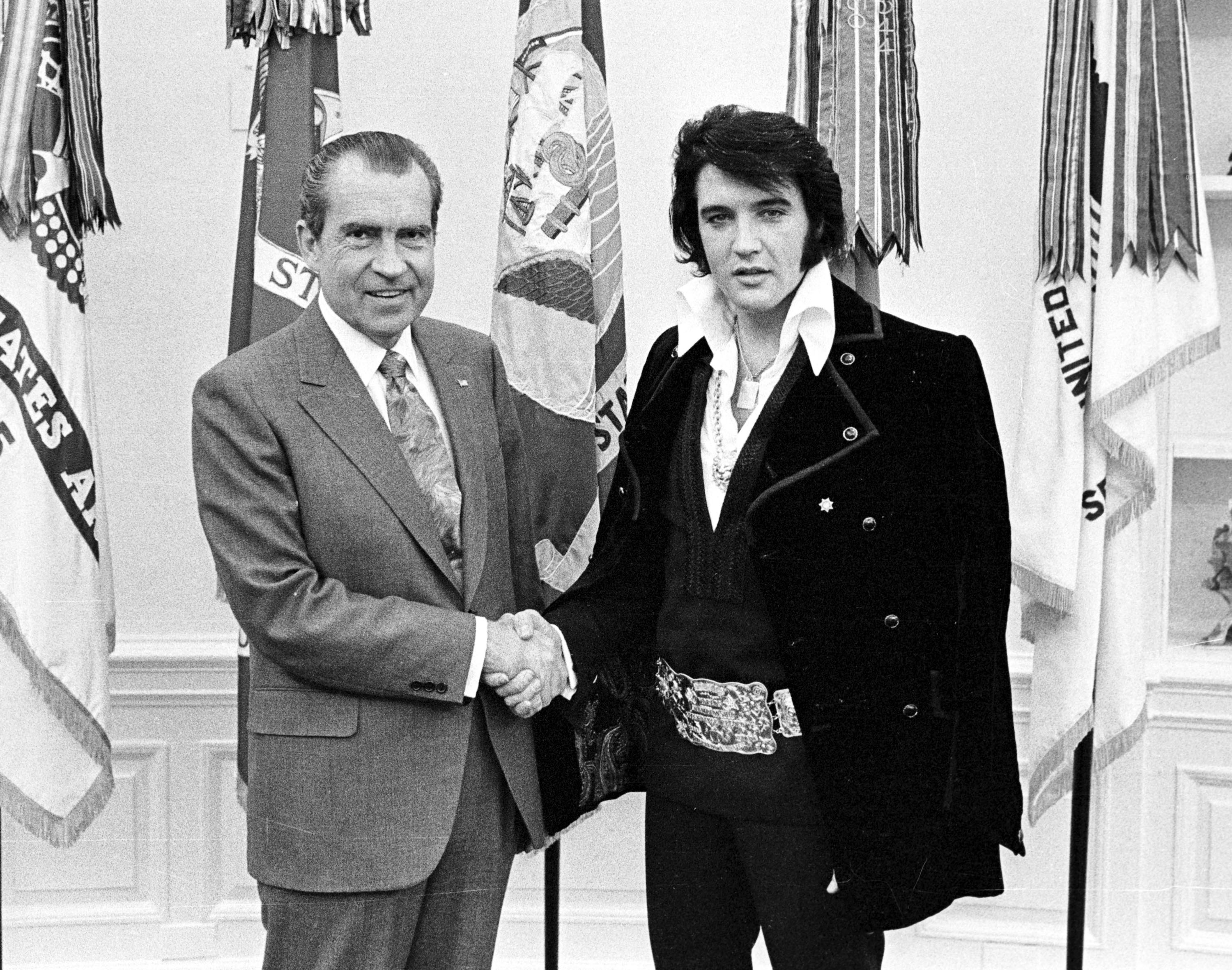 President Richard Nixon shaking hands with Elvis Presley