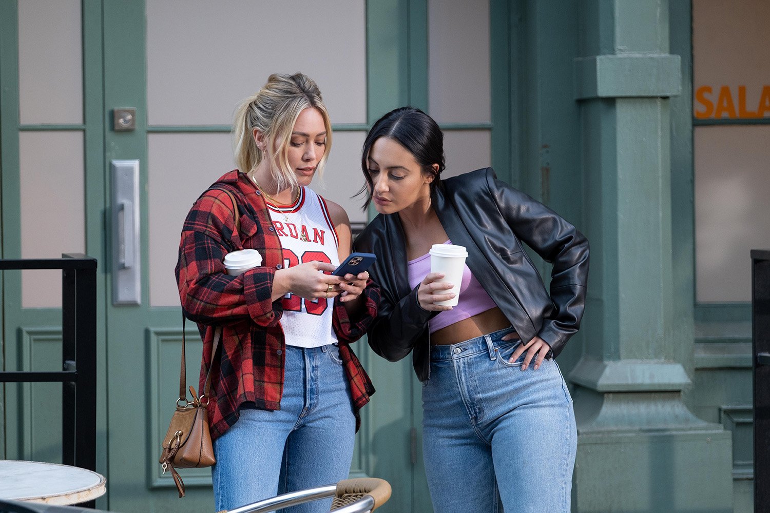 Hilary Duff as Sophie and Francia Raisa as Valentina on How I Met Your Father