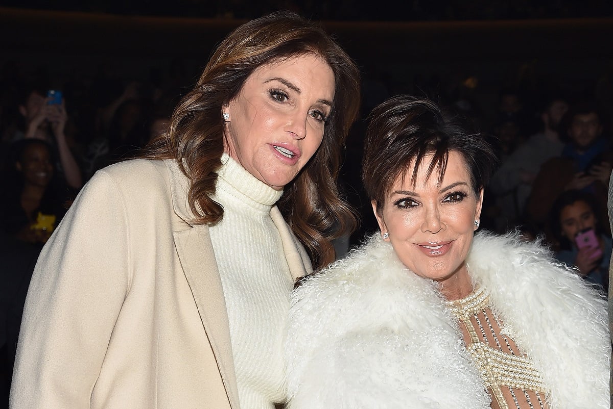 Caitlyn Jenner (L) and Kris Jenner at a fashion show in white