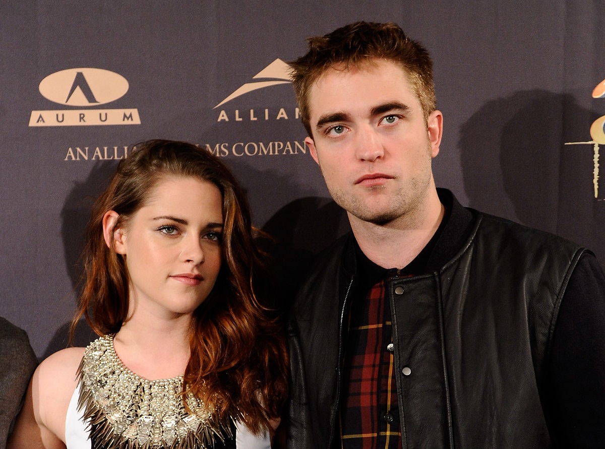 (L-R) Kristen Stewart and Robert Pattinson of the 'Twilight' franchise at a premiere