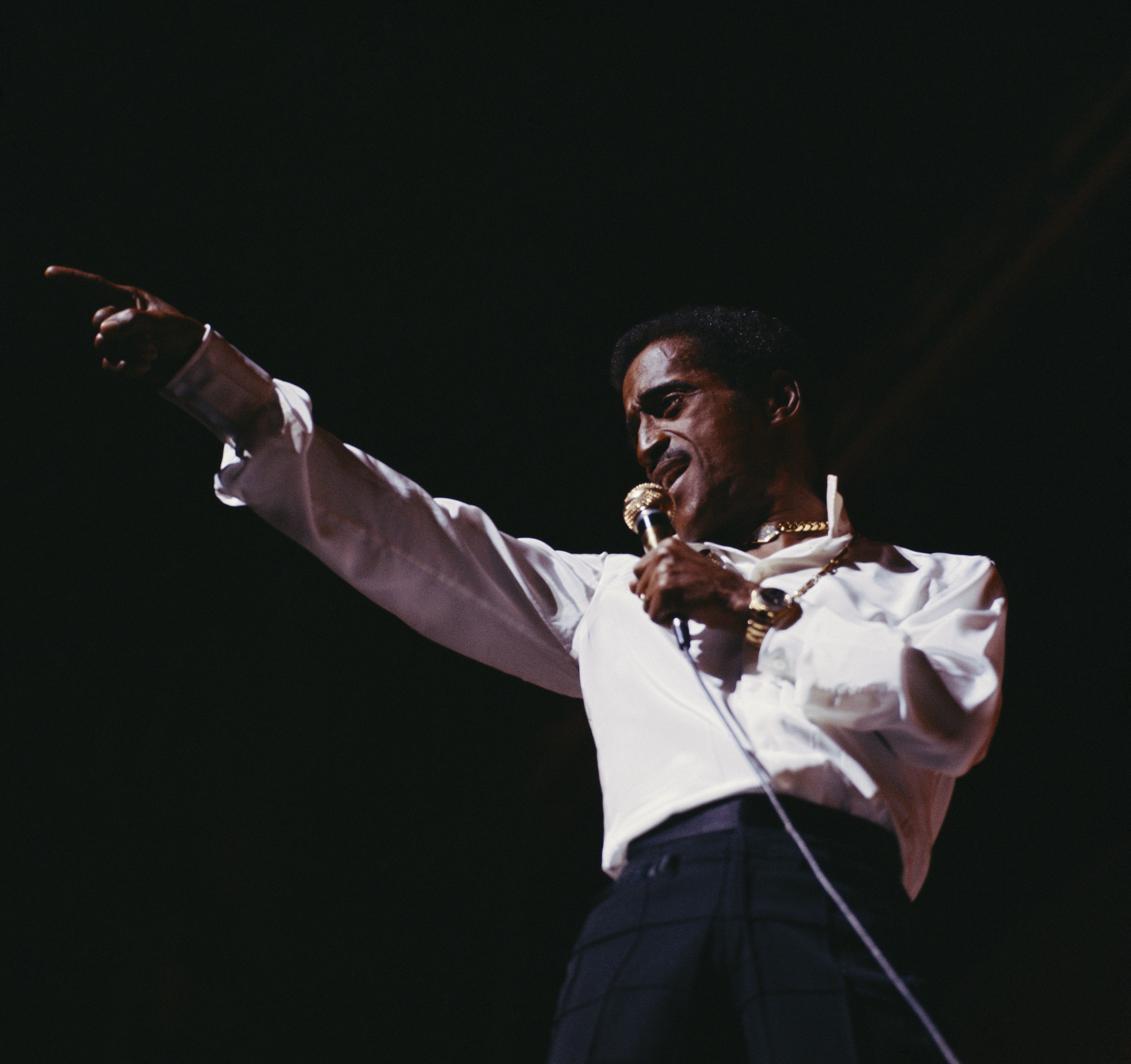 Sammy Davis Jr. with a microphone