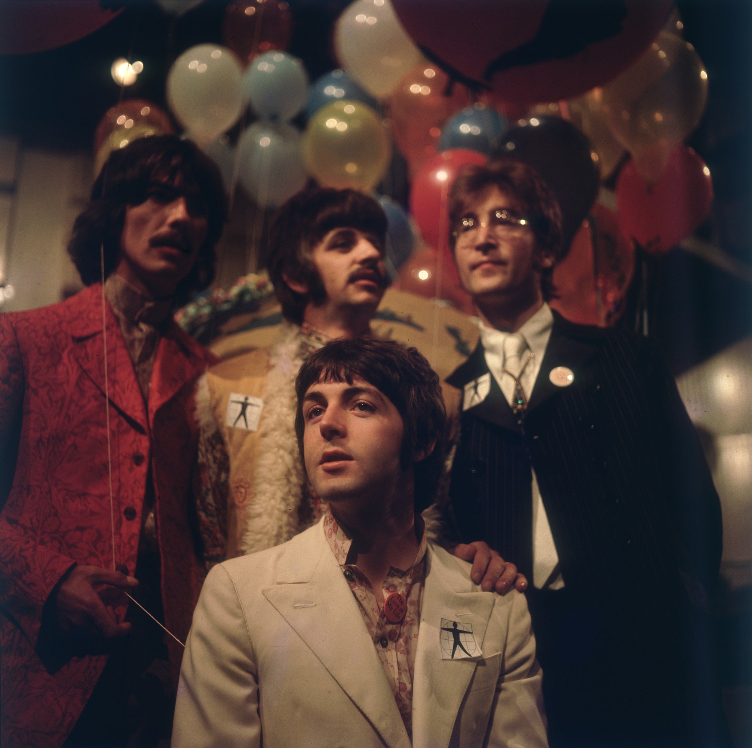 The Beatles' George Harrison, Ringo Starr, Paul McCartney, and John Lennon with balloons before a performance of 'All You Need Is Love'