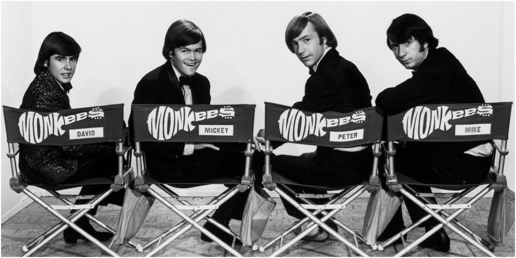 The Monkees cast includes Davy Jones, Mike Nesmith, Mickey Dolenz, and Peter Tork.