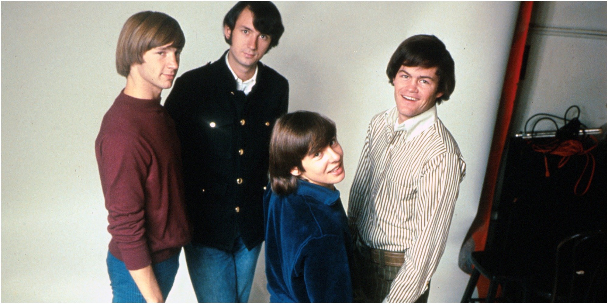 The Monkees cast includes Davy Jones, Mike Nesmith, Mickey Dolenz, and Peter Tork.