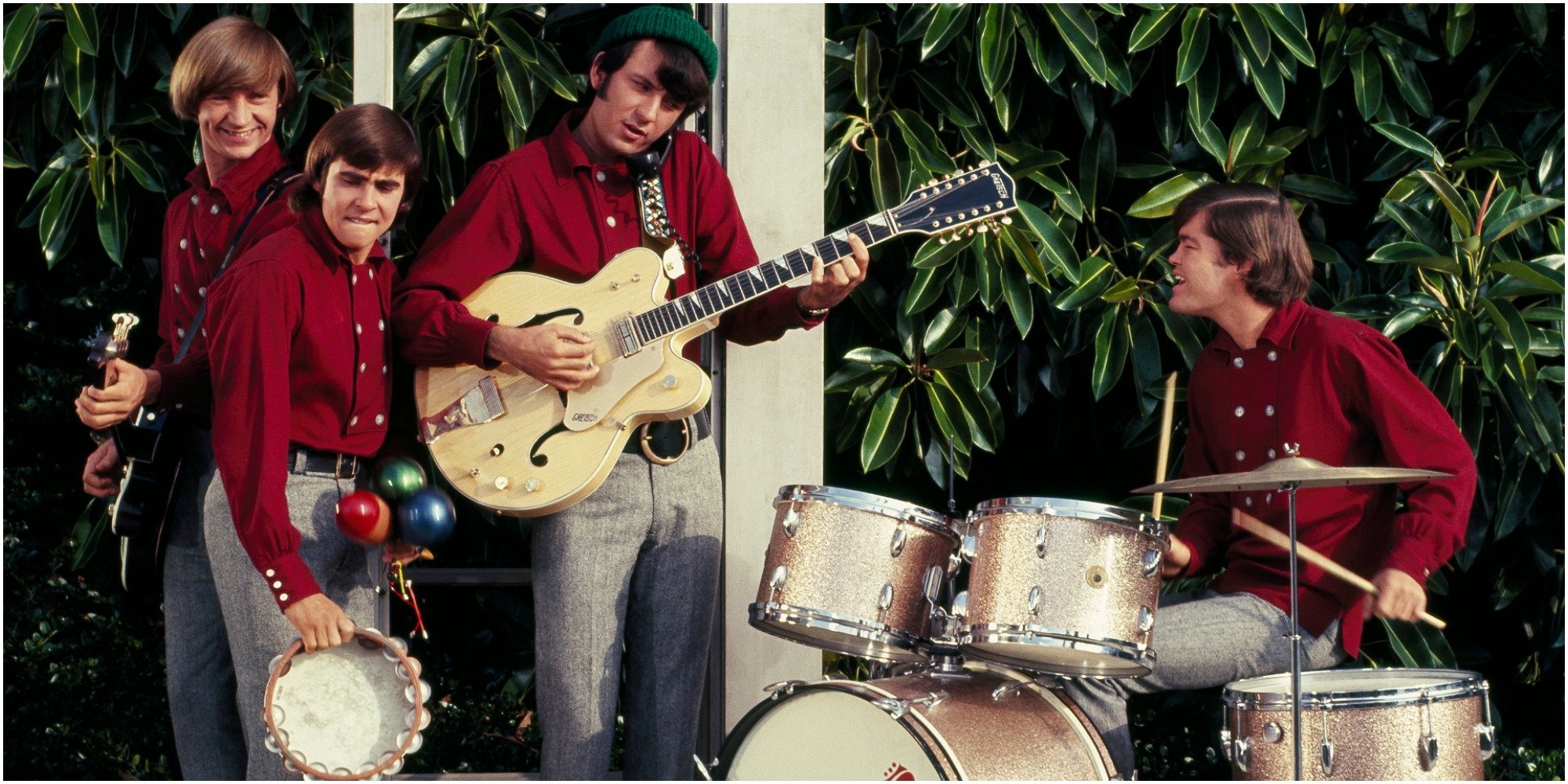 The Monkees pose for a publicity photo on the set of 'The Monkees' television show.