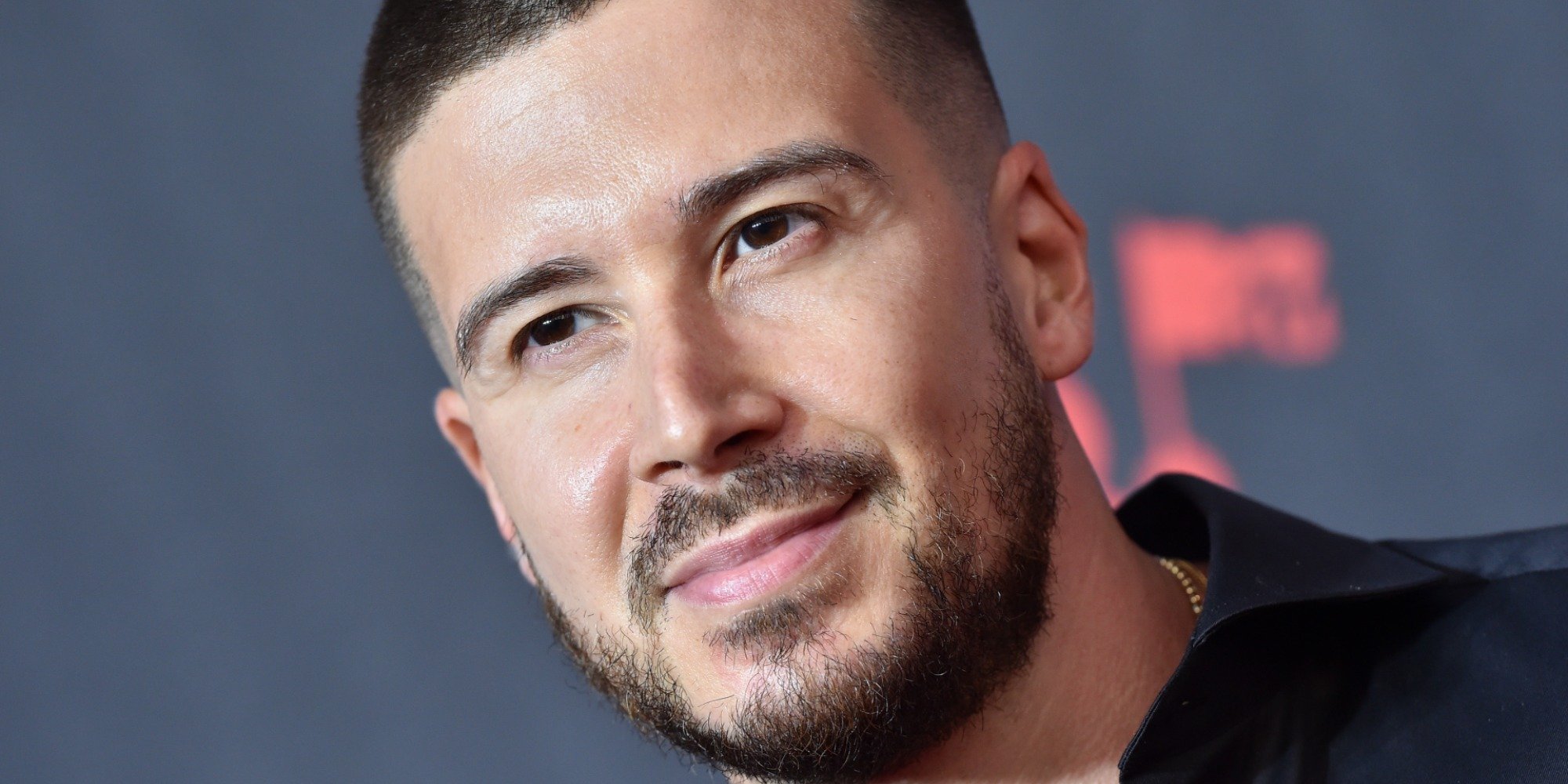 Vinny Guadagnino poses at a red carpet event.